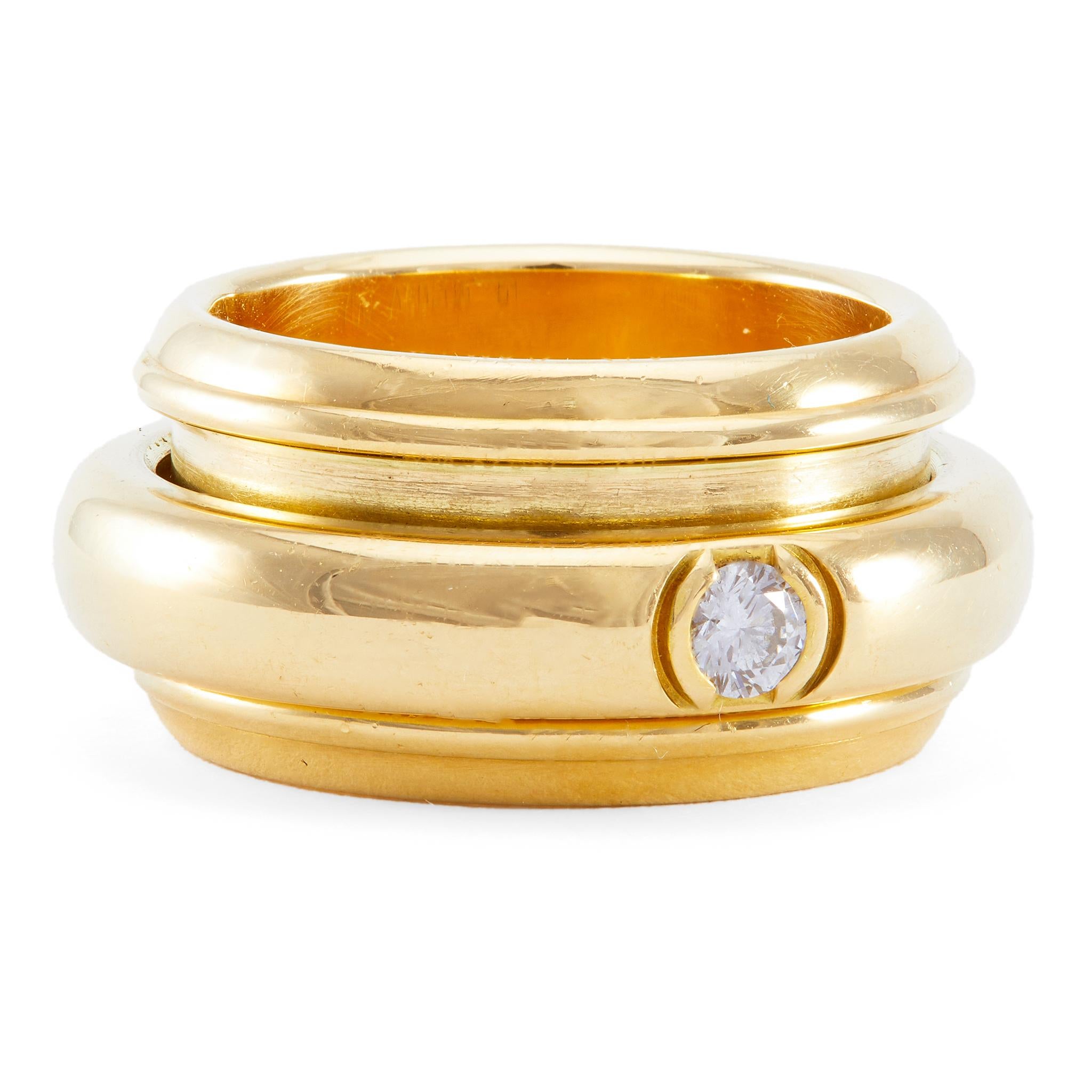 Vintage Piaget 0.13 Carat Diamond 18k Yellow Gold Possession Spinner Ring In Excellent Condition In Beverly Hills, CA