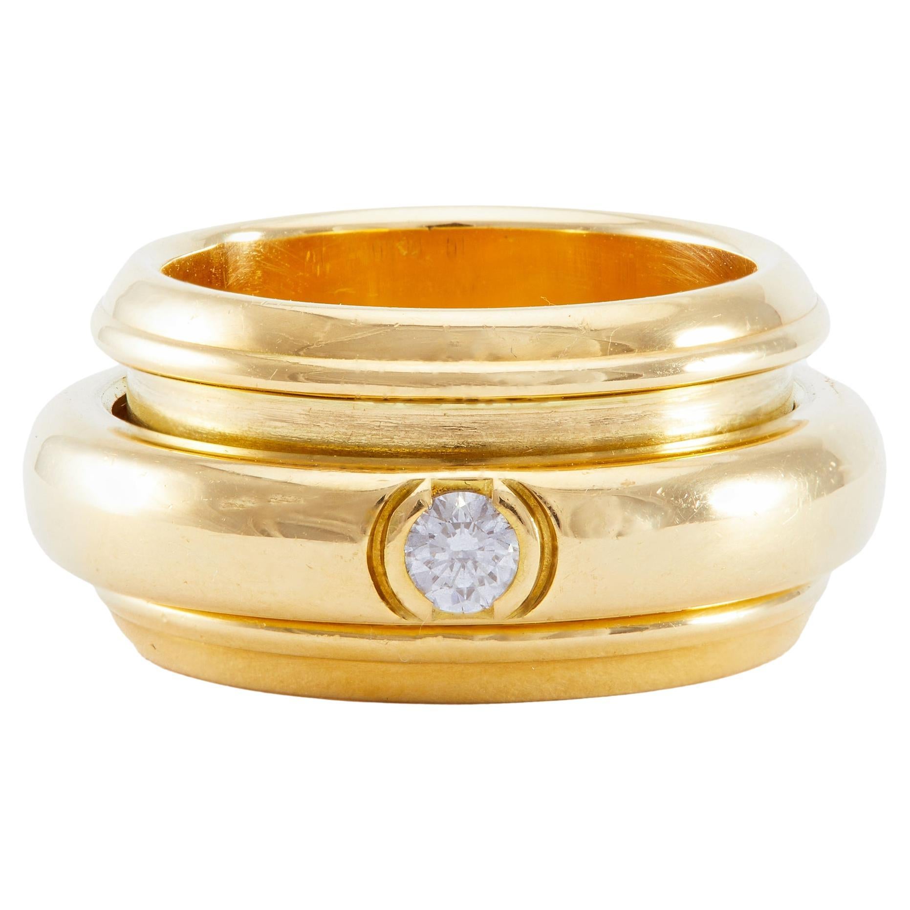 Vintage Piaget 0.13 Carat Diamond 18k Yellow Gold Possession Spinner Ring