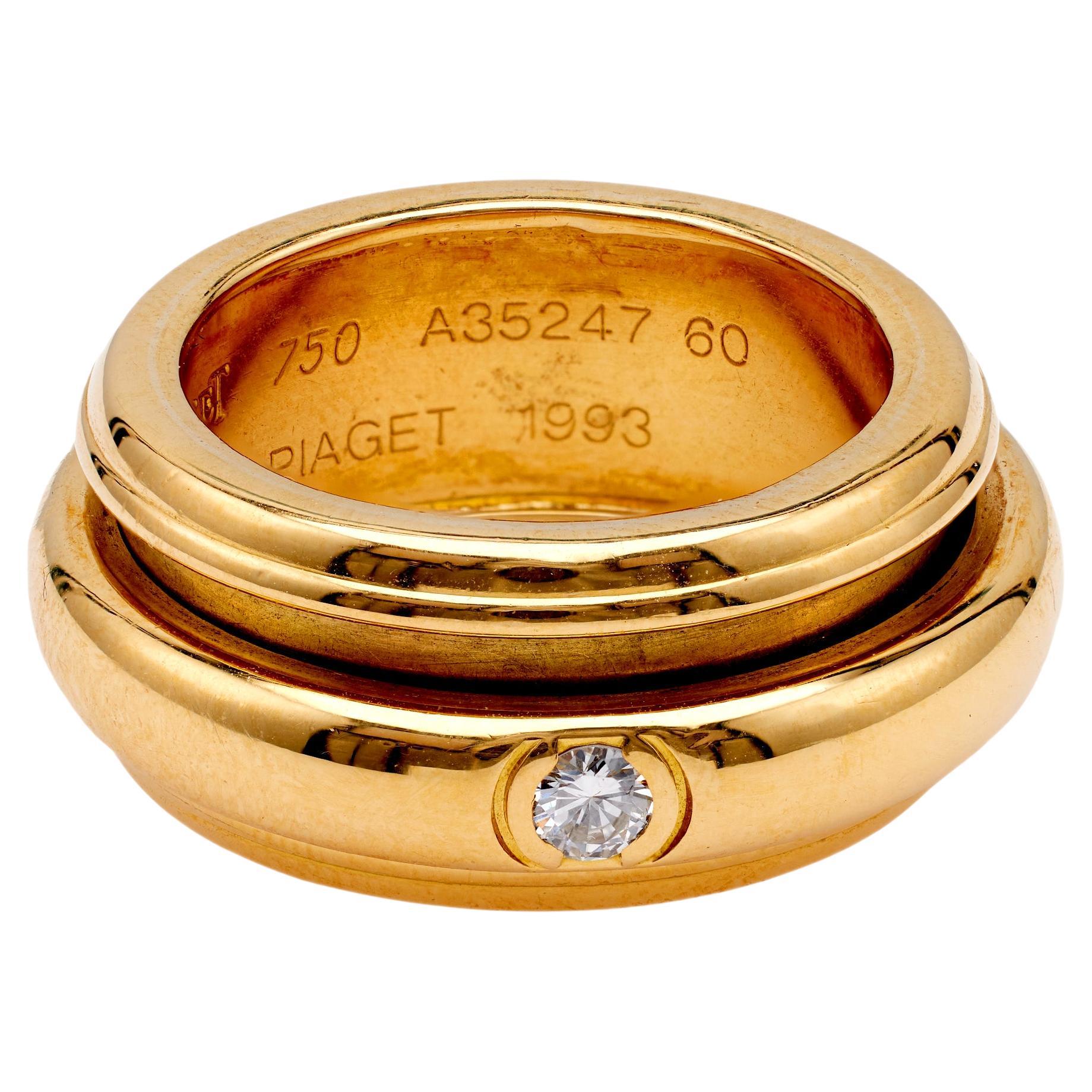 Vintage Piaget 0.13 Carat Diamond 18k Yellow Gold Possession Spinner Ring