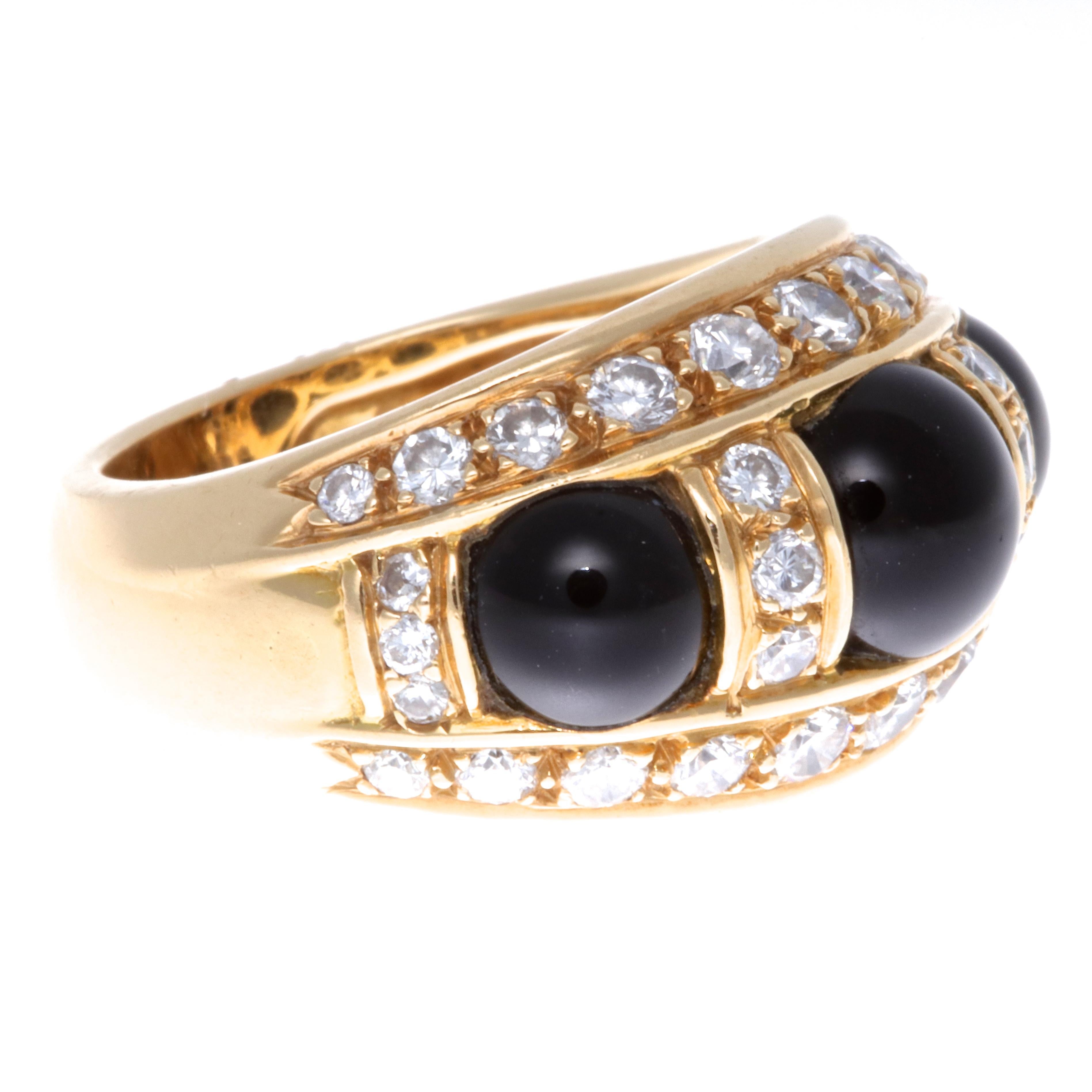 Gold, black and diamonds is the ultimate combo. Especially when it's signed, vintage Piaget. Wear it with an all-black outfit to complete the look or with any other color to make a statement. The ring features 18k gold, onyx and 34 round brilliant