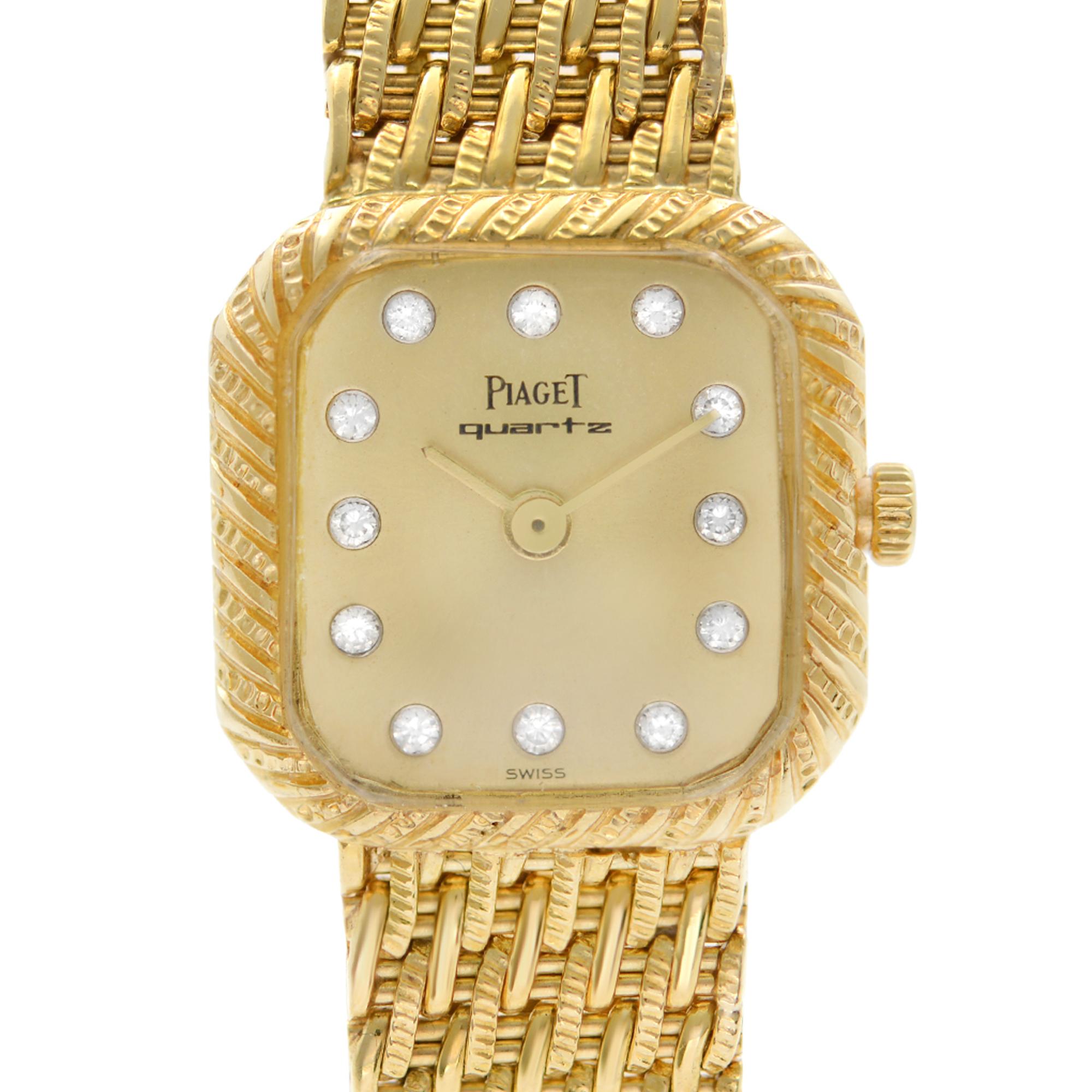 Pre Owned Vintage Piaget 18k Gold Custom Diamond Dial Ladies Quartz Watch 8952 P 31. This Timepiece Features: Yellow Gold Case with a Yellow Gold Bracelet Fixed Yellow Gold Bezel Custom Champagne Diamond Dial with Gold Hands and Diamond Hour