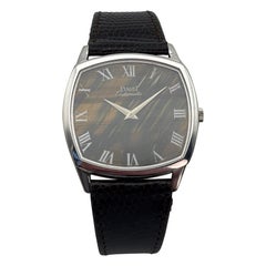 Vintage Piaget 18k White Gold Automatic with Natural Tiger’s Eye Roman Numeral D