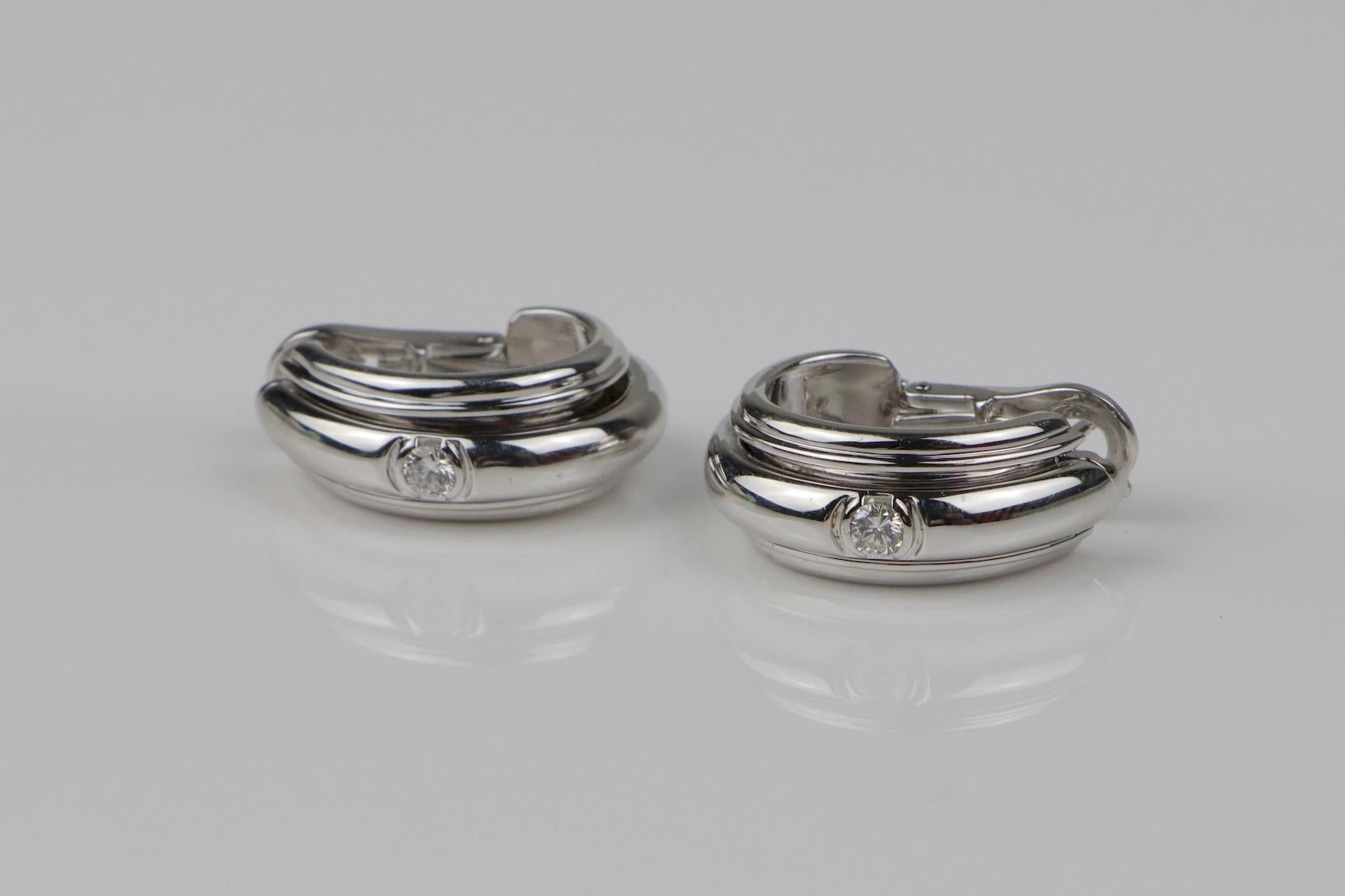 Vintage Piaget 18K White Gold Diamond Possession Earrings 
Stamped:
PIAGET 750 A41934
PIAGET 1995 

Approximate Dimensions:
2.5 cm (Length) x 1 cm (Width) 
20.2 grams in weight