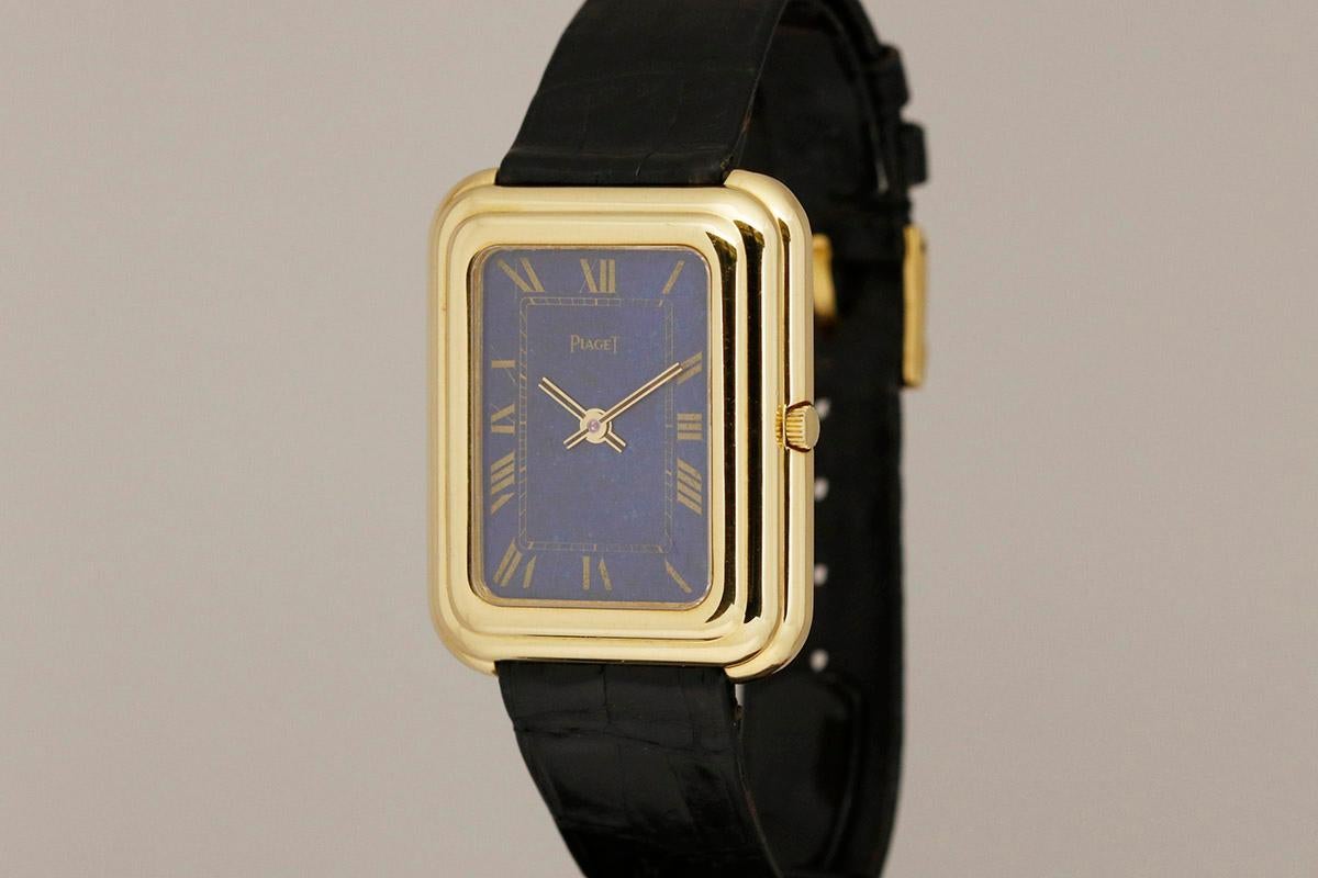 Oversized 18k yellow gold Piaget with lapis lazuli dial,Beta-21 quartz movement on a Piaget strap and buckle.