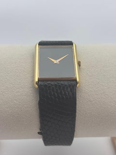 Vintage Piaget 18k Yellow Gold Tank Dress Watch with Minimalist Onyx-Black Dial