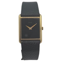 Vintage Piaget 18k Yellow Gold Tank Dress Watch with Minimalist Onyx-Black Dial