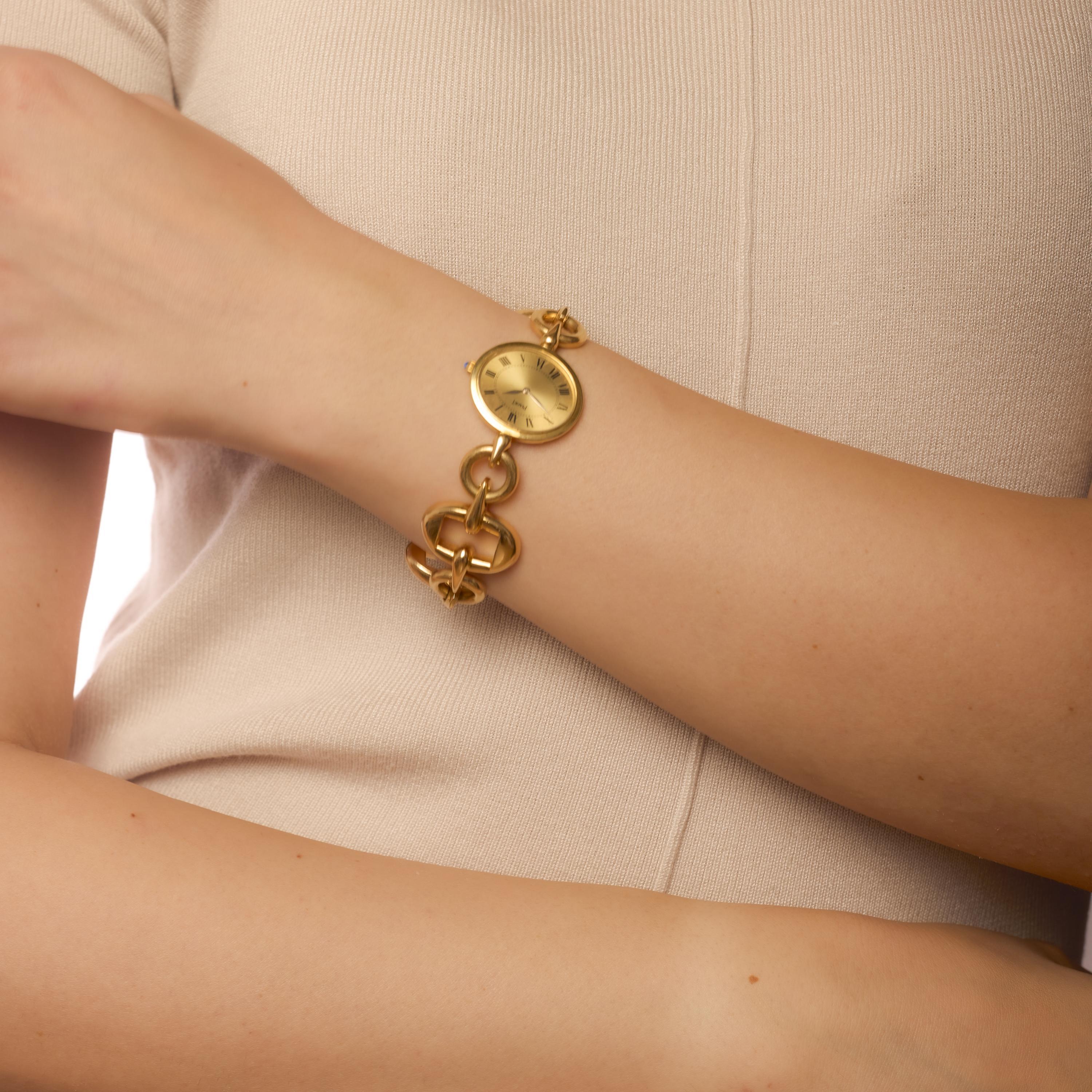 This vintage Piaget watch in rich 18k gold exudes timeless refinement with its luxurious weight, classic styling, and masterful Swiss automatic movement.
