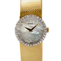 Vintage Piaget Dancer 26MM 9706 B2 18K Gold Diamond Mother of Pearl Dial Watch