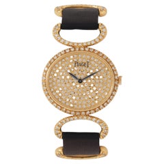 Montre vintage Piaget Diamond Stirrup Model 9802 en or jaune 18 carats