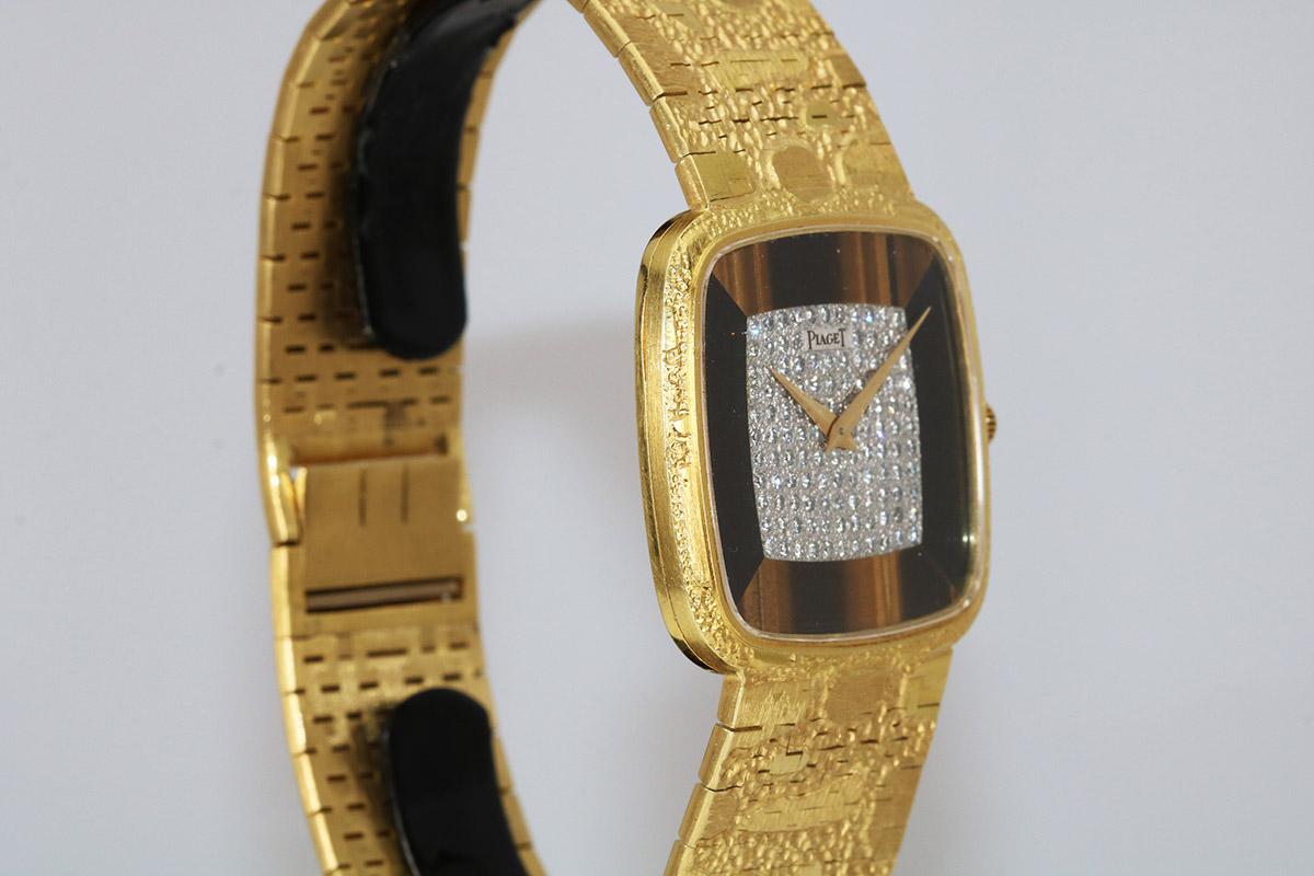 piaget vintage - montre clapet - or jaune et oeil de tigre