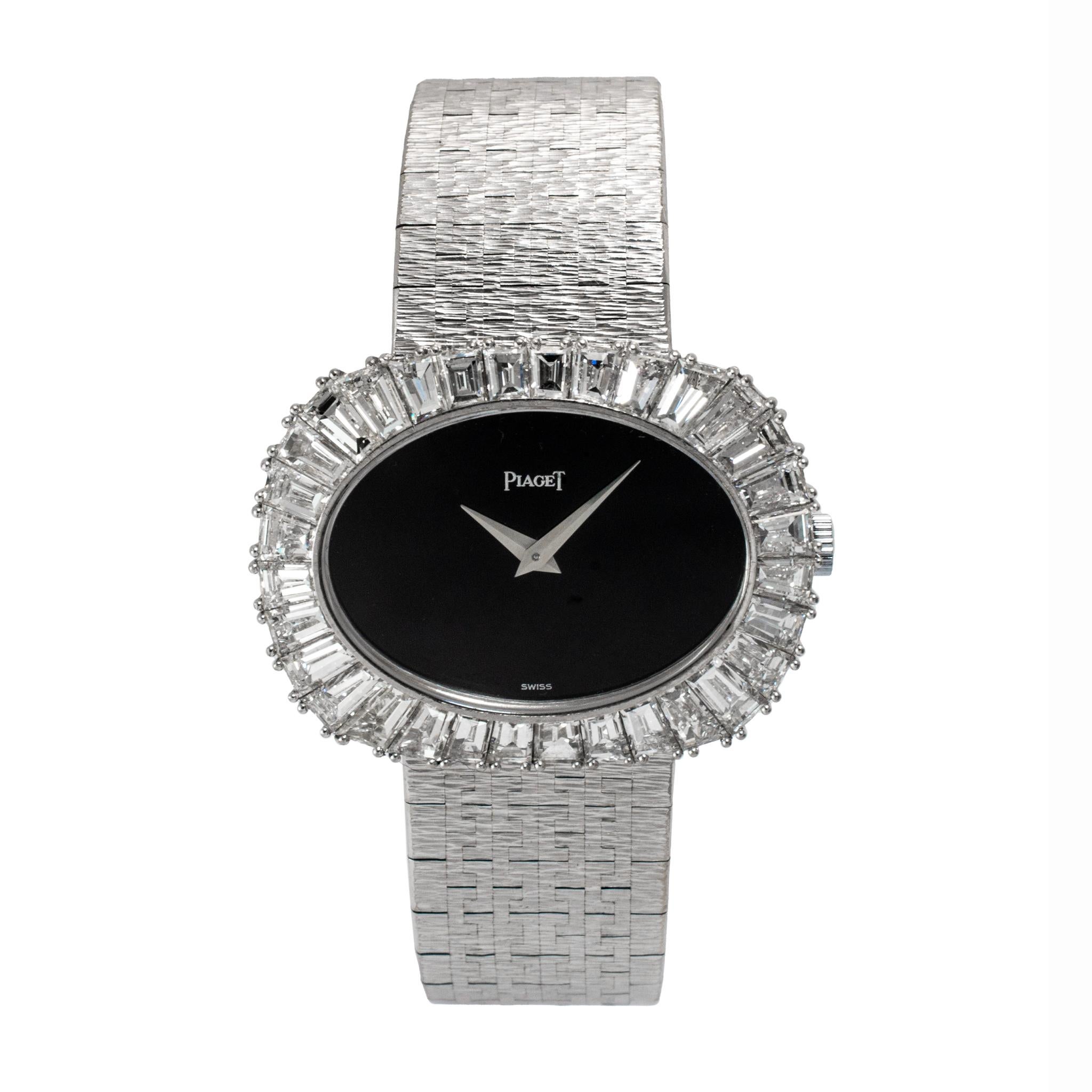 Brand: Piaget

Gender: Ladies

Metal Type: 18K White Gold

Diameter: 34.00 mm

Weight: 76.75 grams

Lady's 18K white gold diamond and onyx Swiss-made wristwatch. Engraved with 