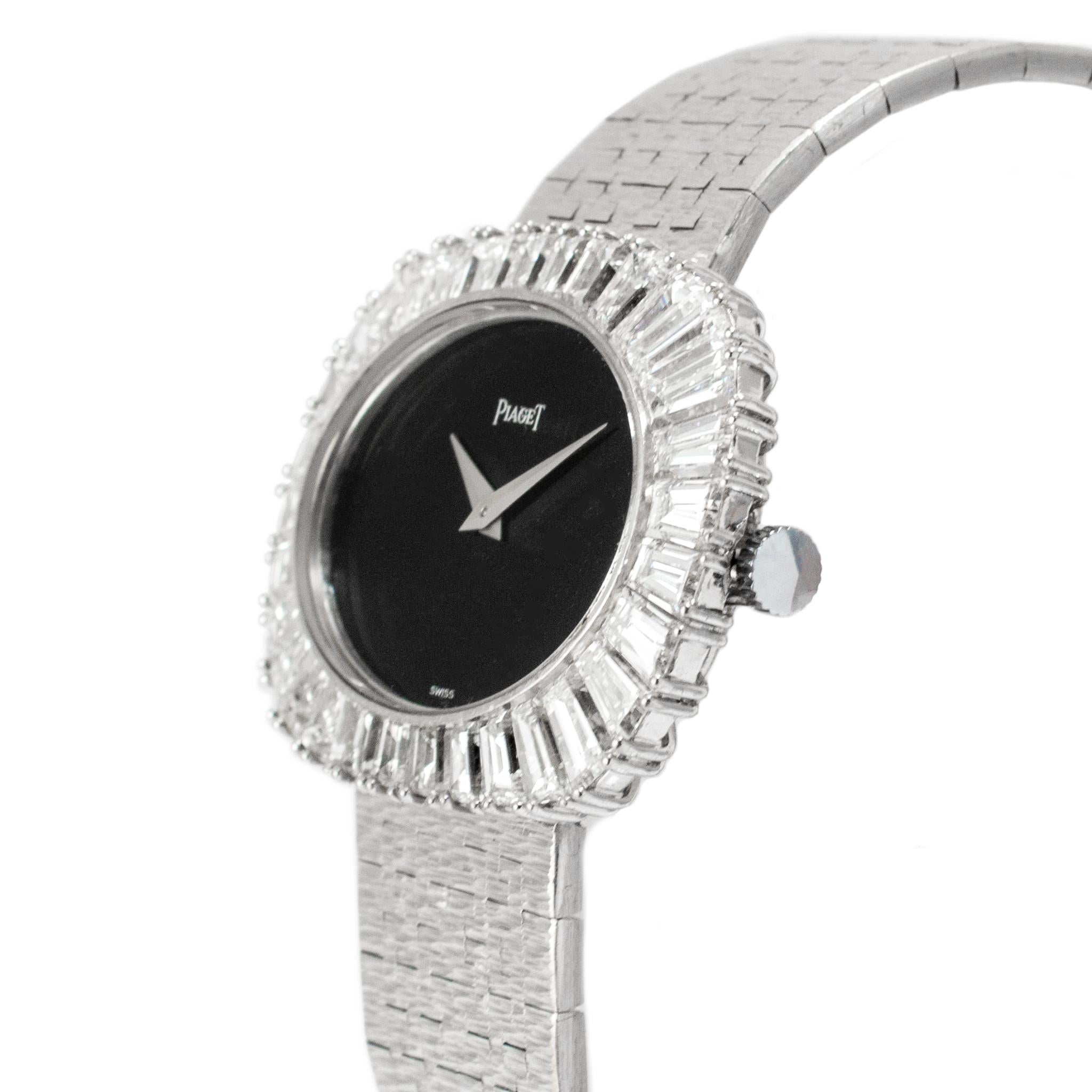 Vintage Piaget Horizonal Oval 34M 98323A6 White Gold Baguette Diamond Onyx Watch In Excellent Condition For Sale In Houston, TX