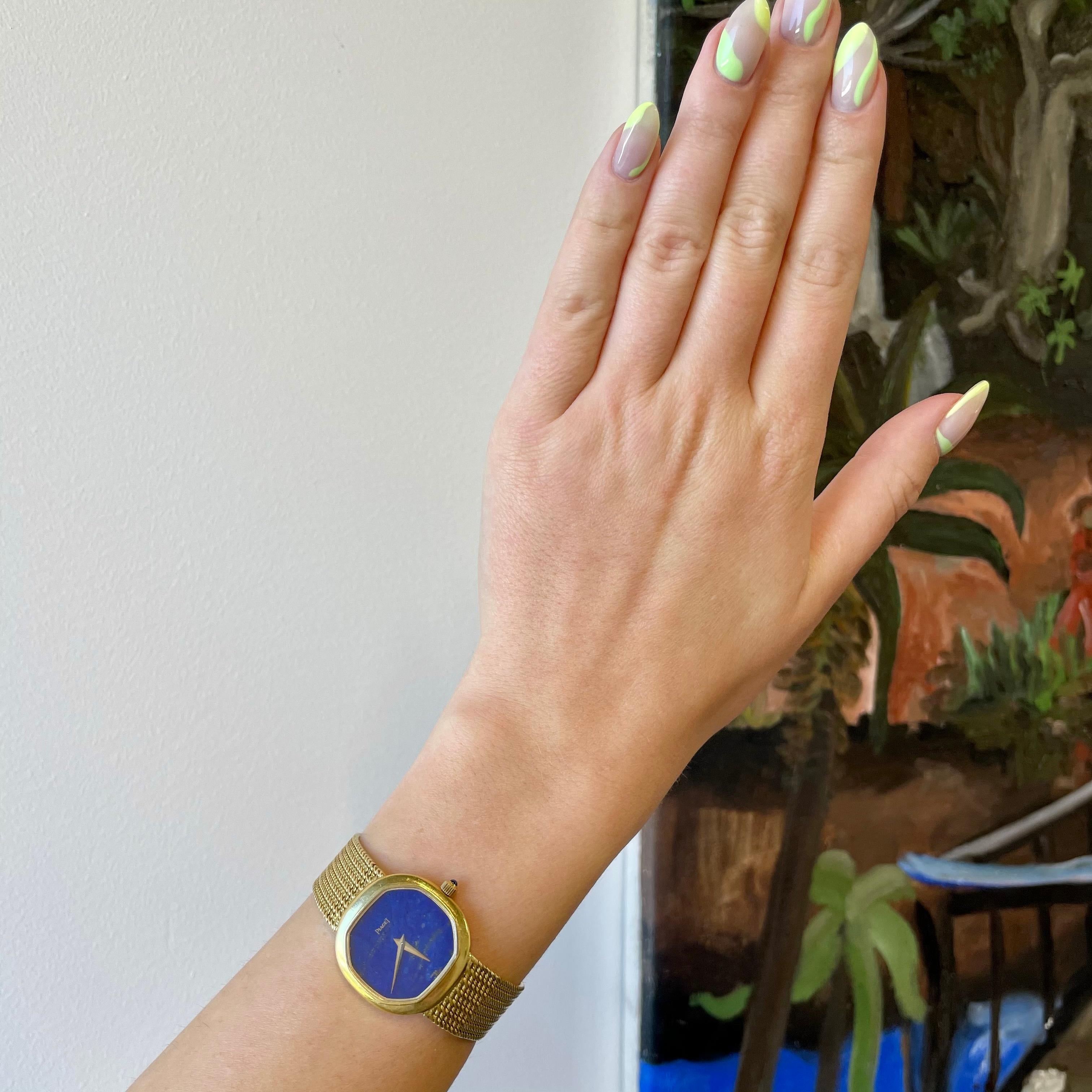 You'll enjoy telling time the old fashioned way. Seeing the sky blue Piaget watch on your wrist will not only brighten your day but you'll also own a timepiece of sophisticated luxury. 

Vintage Piaget Lapis Lazuli 18k Gold Watch. Featuring a