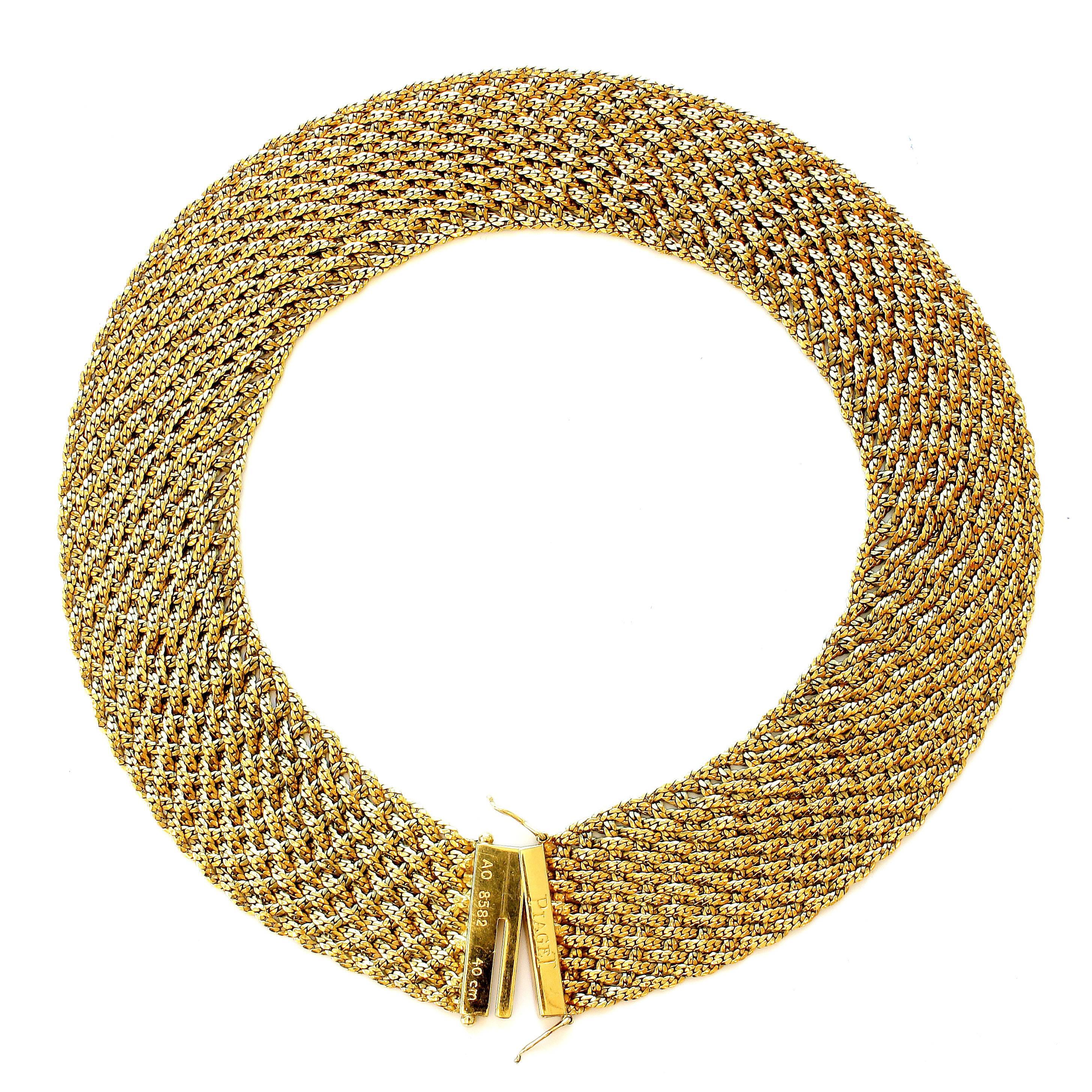 Created by Piaget this gold necklace is smooth as silk and just as flexible. Superior gold threading has developed a necklace that moves like a scarf being blown in the air. Fashioned in multihued 18k gold. Signed Piaget and stamped with French