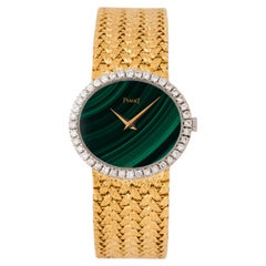 Vintage Piaget Model 9806 D2 18 Karat Yellow Gold Diamond Bezel Malachite Dial