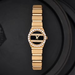 Vintage Piaget Polo Model 846C701 18 Karat Gold Onyx and Diamonds Watch