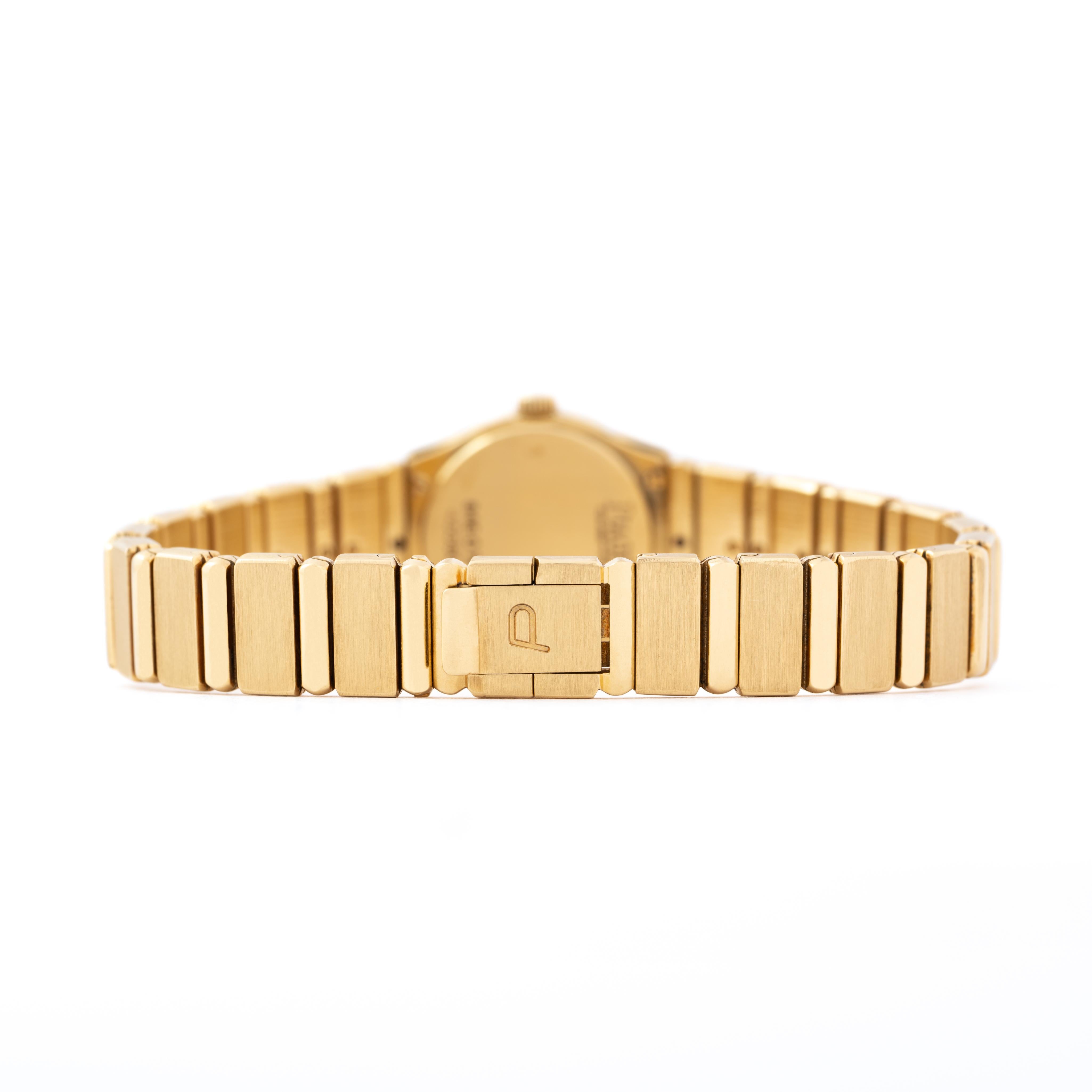 Vintage Piaget Polo Model 846C701 18 Karat Gold Onyx and Diamonds Watch In Good Condition In New York, NY