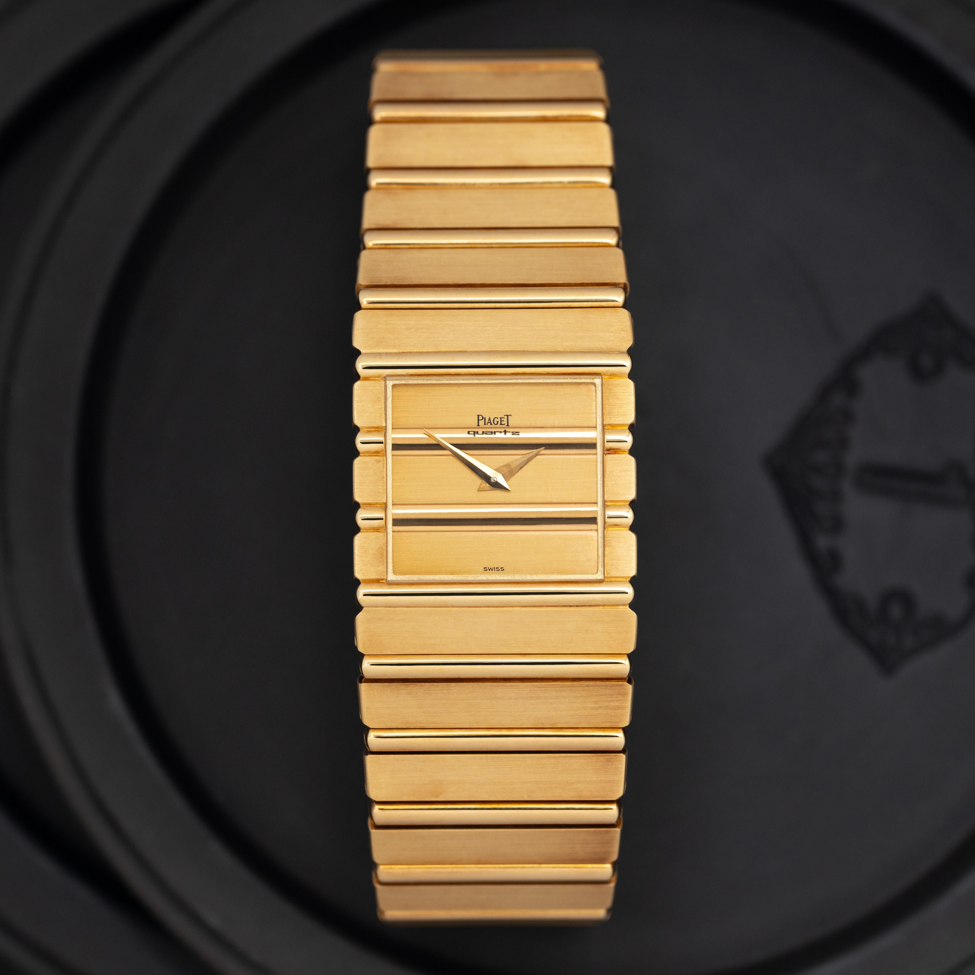 Vintage Piaget Polo Model 7131 C701 18k Yellow Gold, Quartz Movement 
Made in Switzerland c.1990s

Maker: Piaget
Model: Polo 7131 C701
Year: 1980s
Material: 18K Yellow Gold
Dial: Gold with Black markers
Case Measurement: 25mm
Movement: