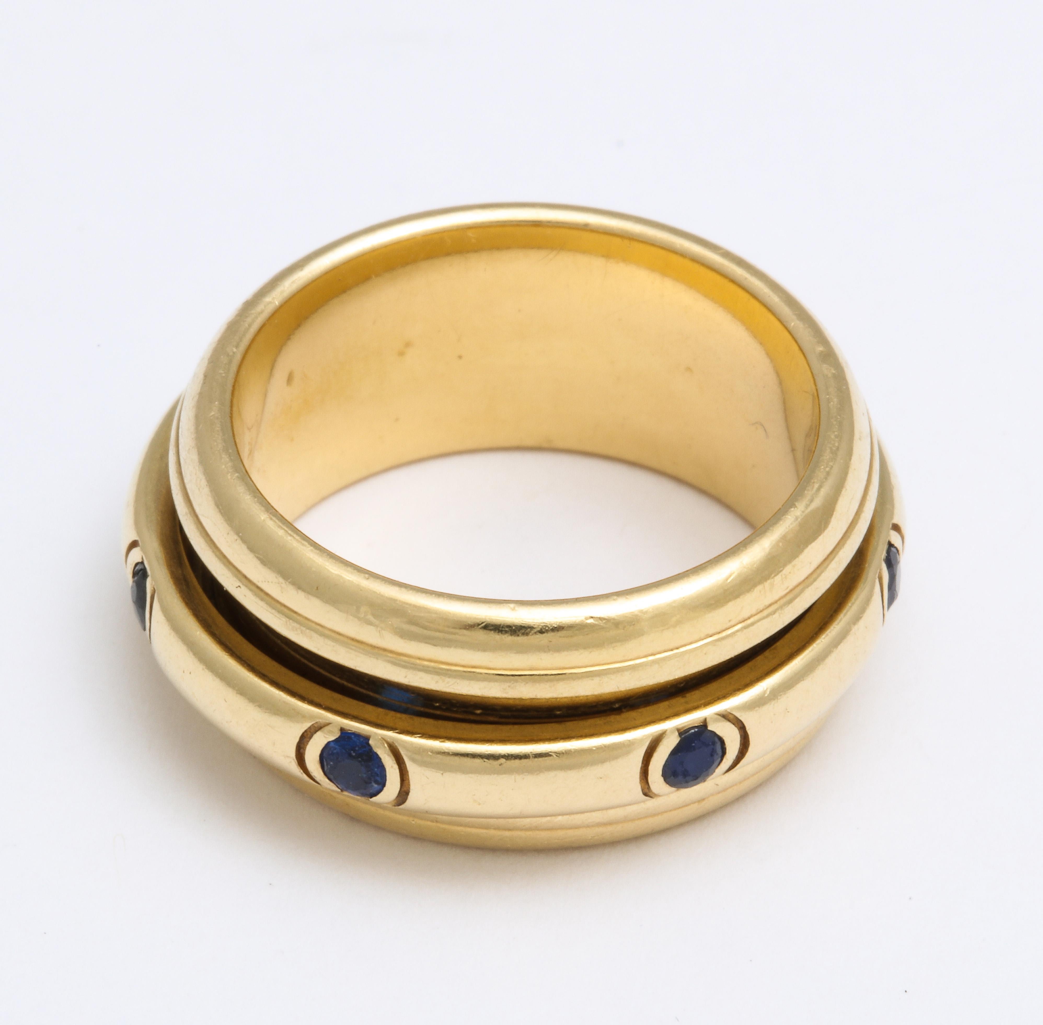 Modern Vintage French  Piaget Sapphire and 18 Karat Gold Fidget Ring