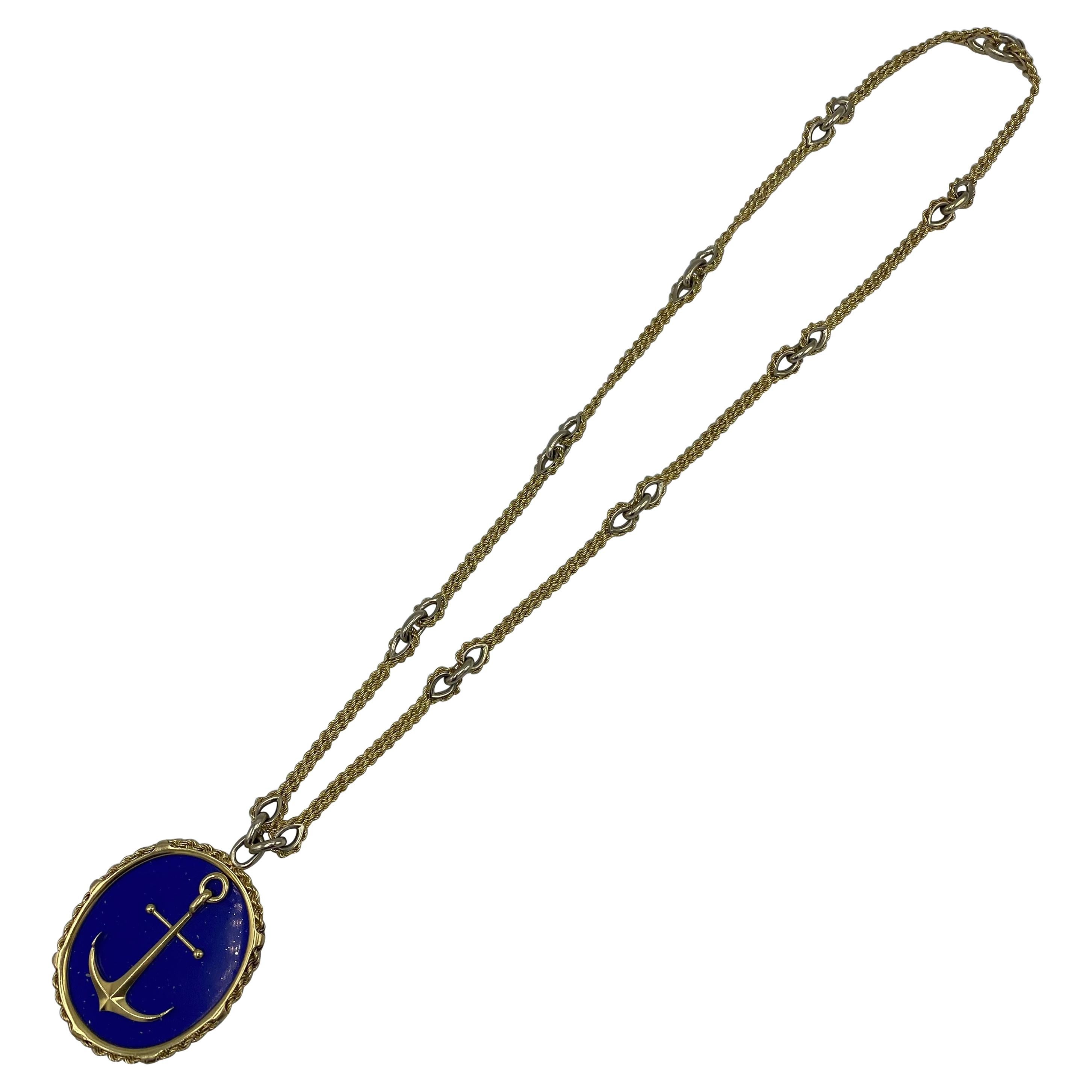 Product details:

The necklace and the pendant both signed by Piaget. The necklace is made out of 18 karat yellow gold and it features twisted robe link with nautical motif. The pendant is made out of 18 karat yellow gold and lapis, featuring