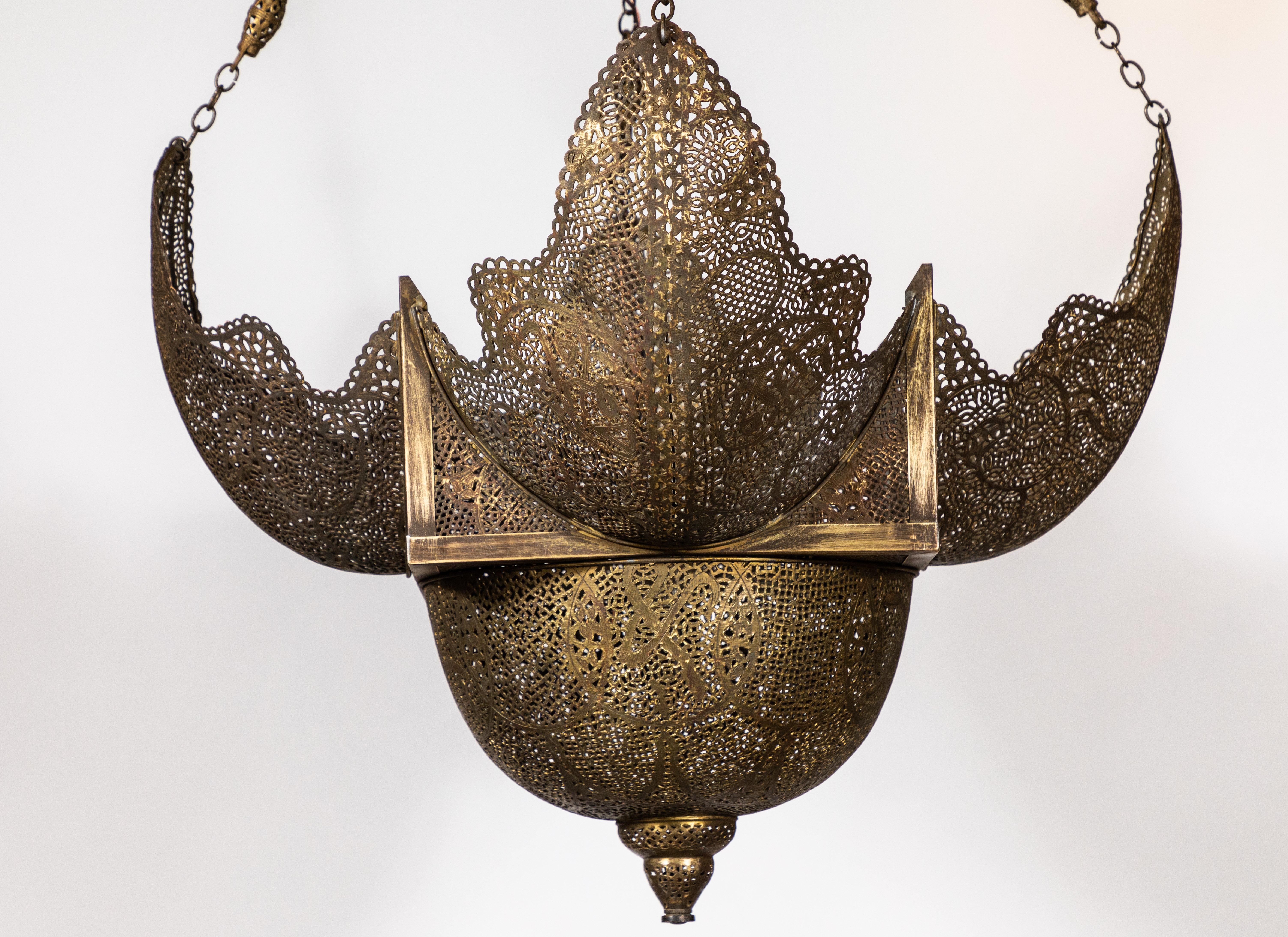 Vintage large scale pierced brass Moroccan pendant light with original decorative chain, newly rewired.