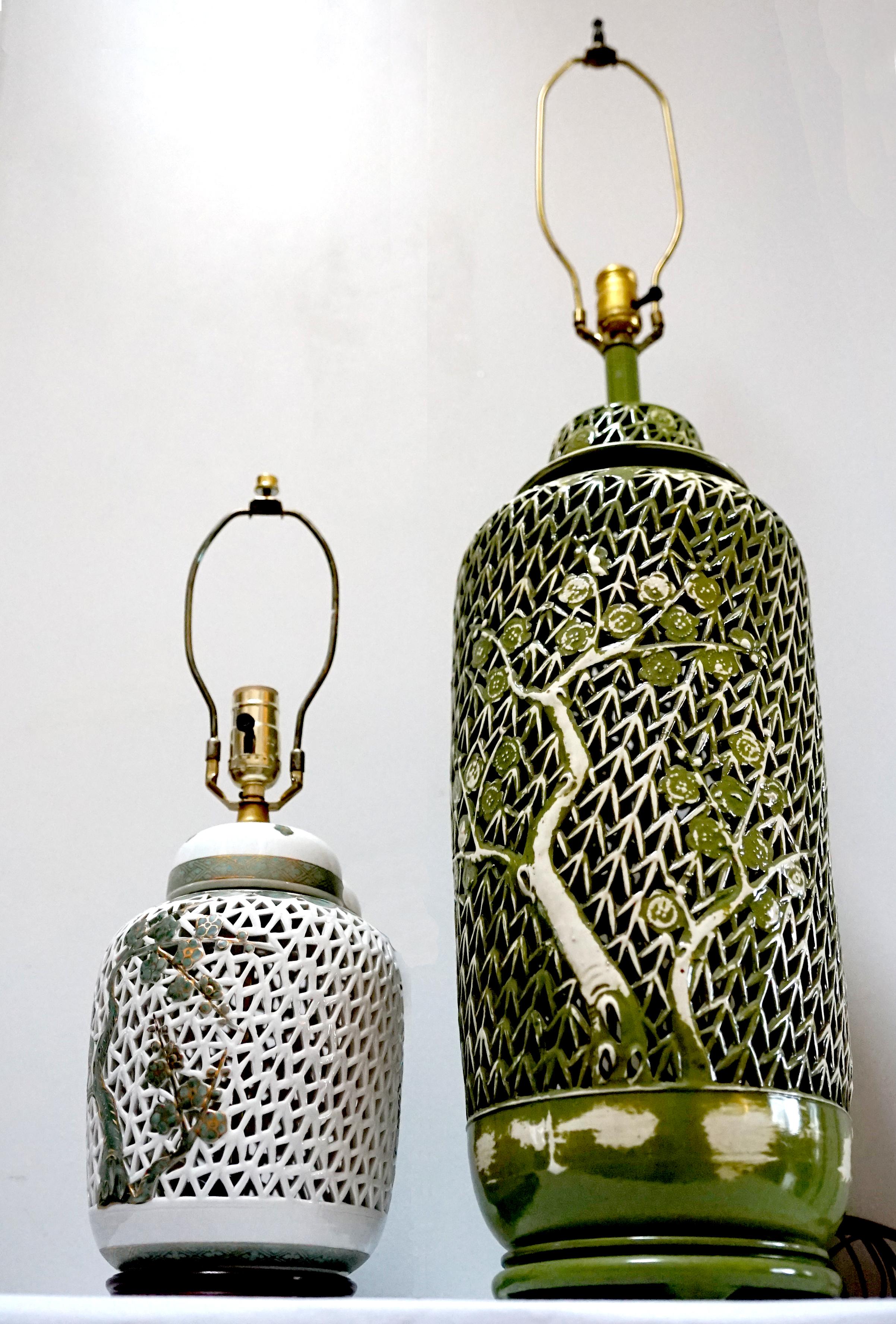 A vintage Chinoiserie assembled set of pierced pierced  overlaid olive green and white glazed table lamp
unattributed maker, created in the second half of the 20th century. These lamps are so unusual and elegant with their pierced ceramic exterior. 