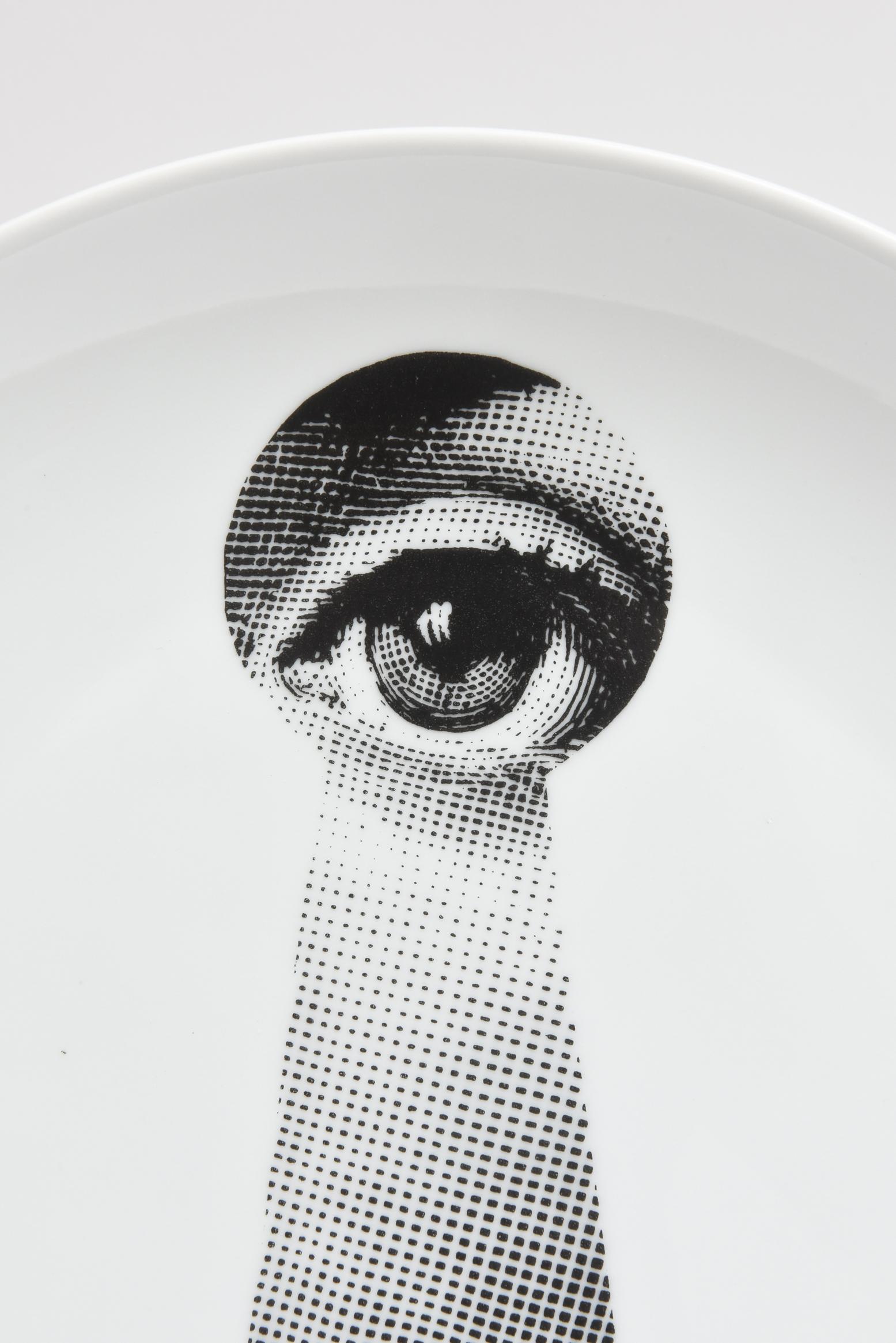 A Classic midcentury Italian Designed plate featuring an iconic image from Piero Fornasetti’s work, his muse the opera singer, Lina Cavalieri. Crisp black and white timeless design in very good vintage condition.