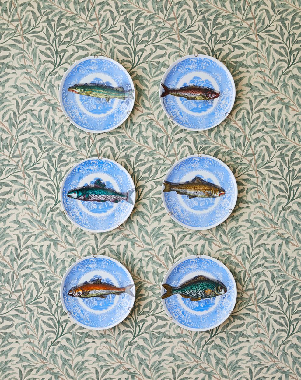 Piero Fornasetti
Italy, 1955

Six porcelain hanging platters with various printed polychrome fish on blue and white base. Stamped “Piscibus Fornasetti”. 

About
Italian painter, sculptor and illustrator Piero Fornasetti (1913-88) - famous for