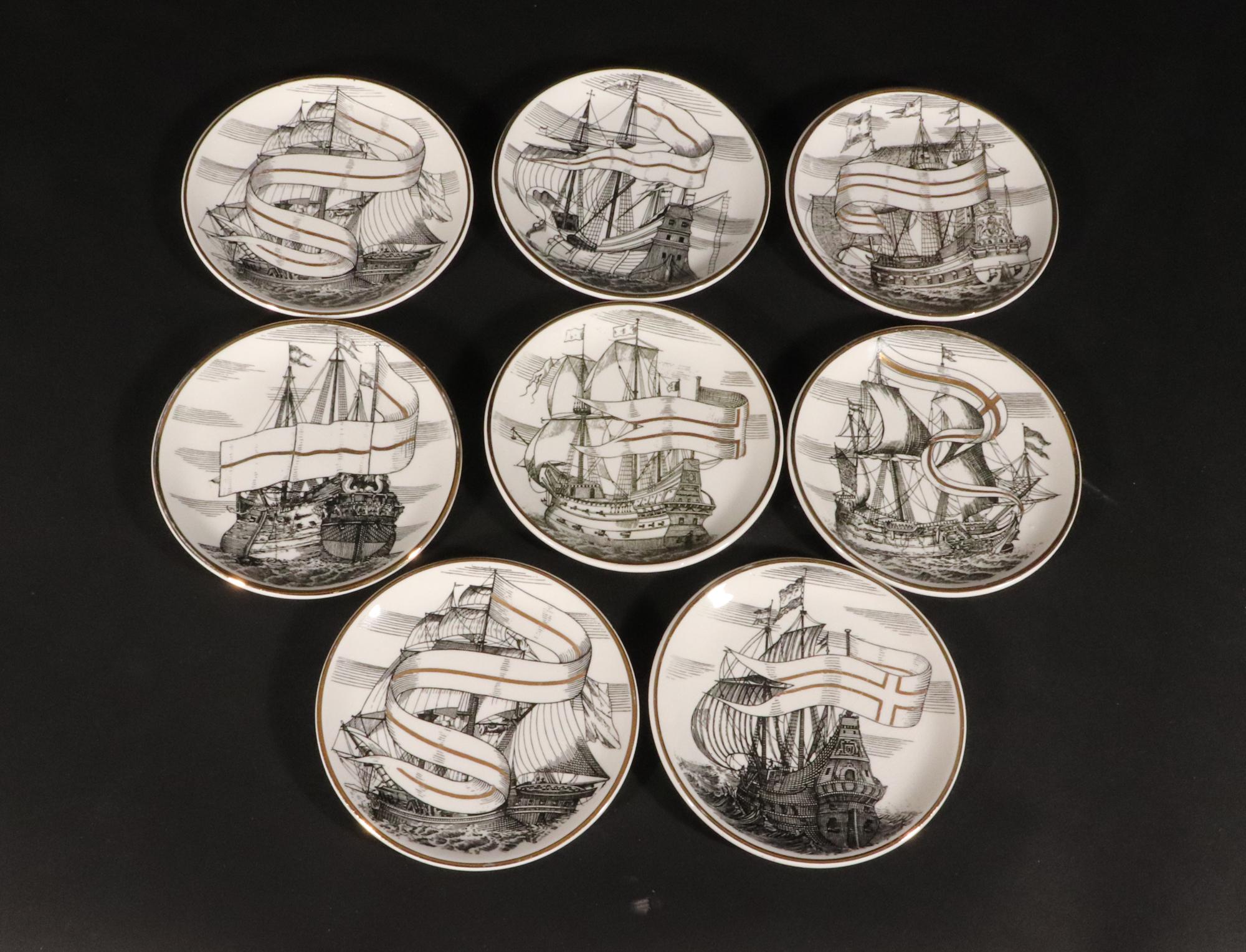 Vintage Piero Fornasetti Tall Ship Ceramic Coasters with Original Box,
Velieri Pattern,
1950s-1960s.

The complete set of eight Piero Fornasetti coasters each depict Spanish Galleons.  The coasters come with their original blue box with a compass
