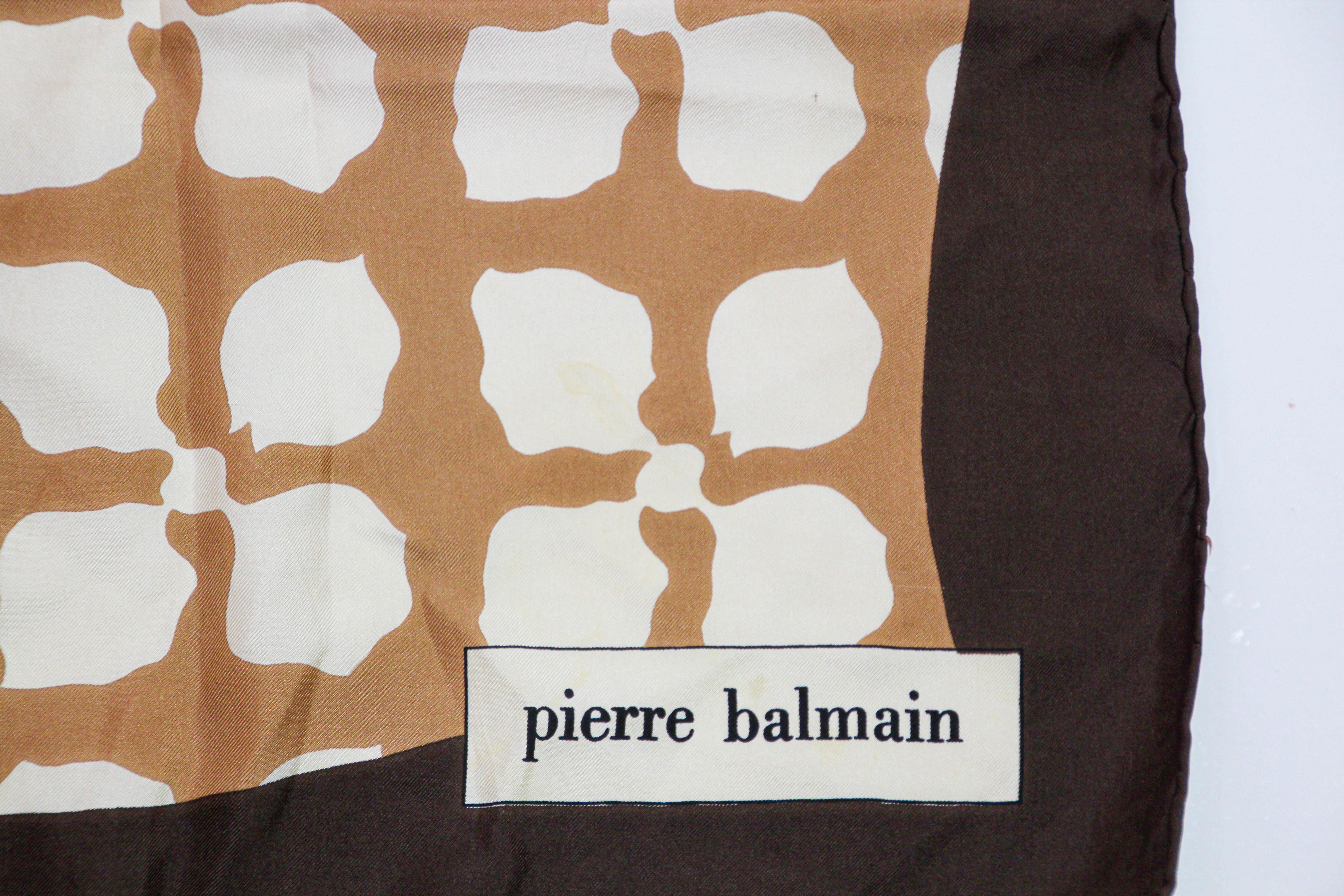 Vintage Pierre Balmain brown silk scarf.
Carre silk foulard accessories by Pierre Balmain Couture Paris.
Designed by French designer Pierre Balmain.
Floral abstract post modern design silk hand rolled hem along the sides.
Great gift 100 % silk,