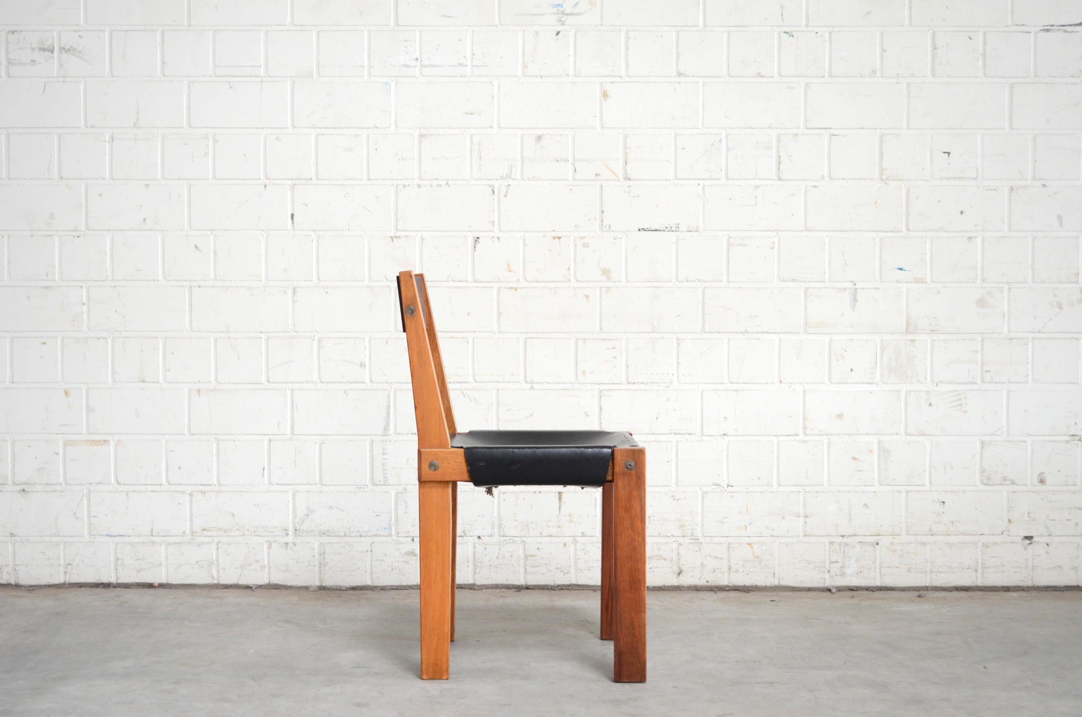 The Model  S 24 Pierre Chapo dining chair is a masterpiece.
Pierre Chapo designed this chair 1967 for his friend Dr. Hiroshi Nakajima.
Made of oiled elm wood and black saddle leather.
This chair is an early version and is dated of the late 60ties 