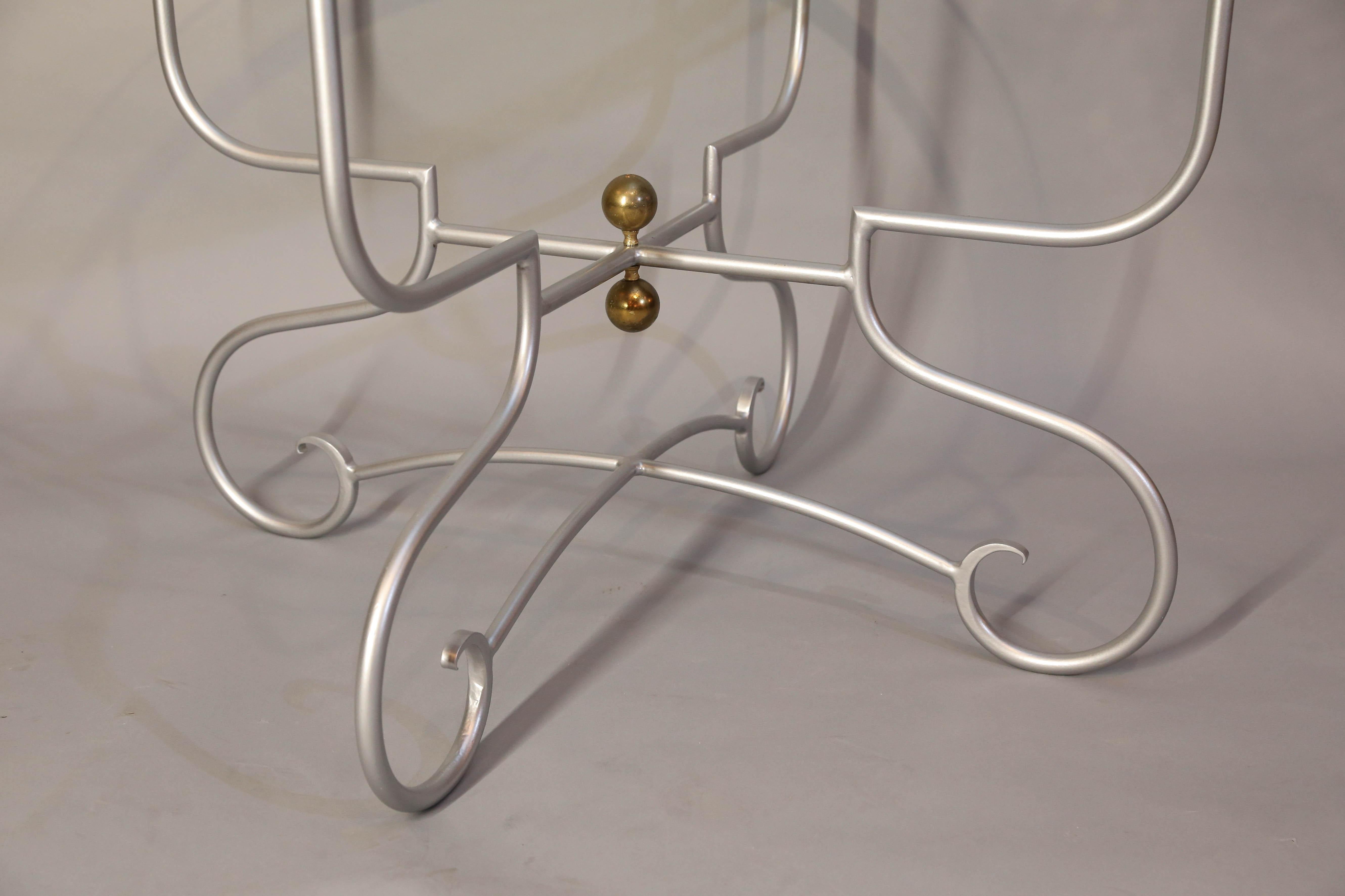 Pierre Deux-style bistro table base has recently been powder-coated in the
 color BMW Silver
Classic design features brass ball finials.
48