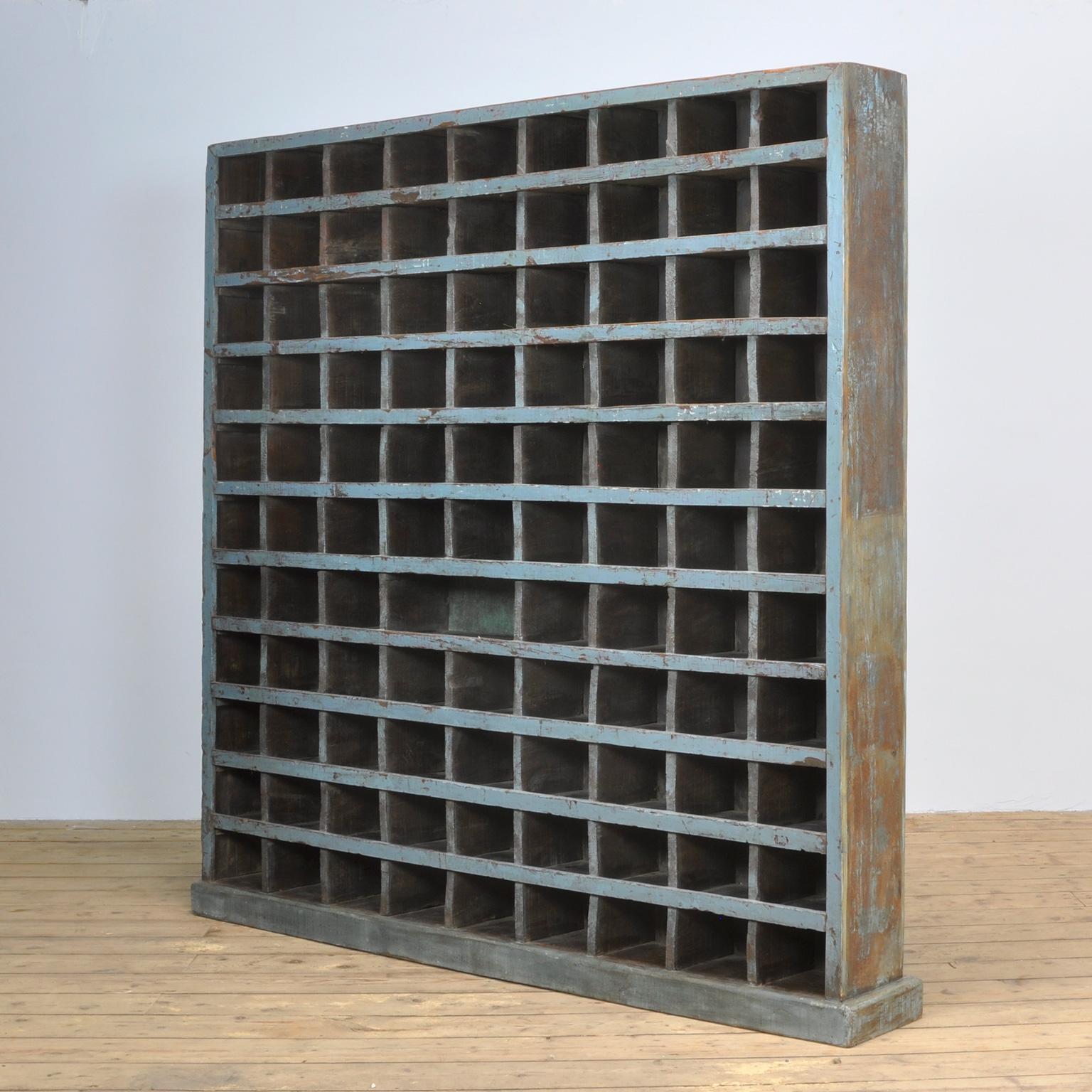 Pigeon hole cabinet made of tropical hardwood. Produced in India in the 1950s. Heavy quality.