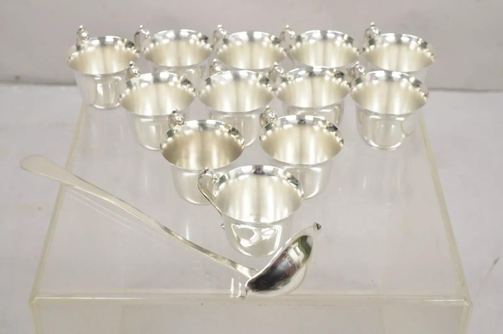 Vintage Pilgrim Regency Style Silver Plated Punch Cups & Ladle - 13 Pcs. Listing includes (12) cups, (1) Ladle spoon, original hallmark. Circa Mid 20th Century. Measurements: Cups: 3