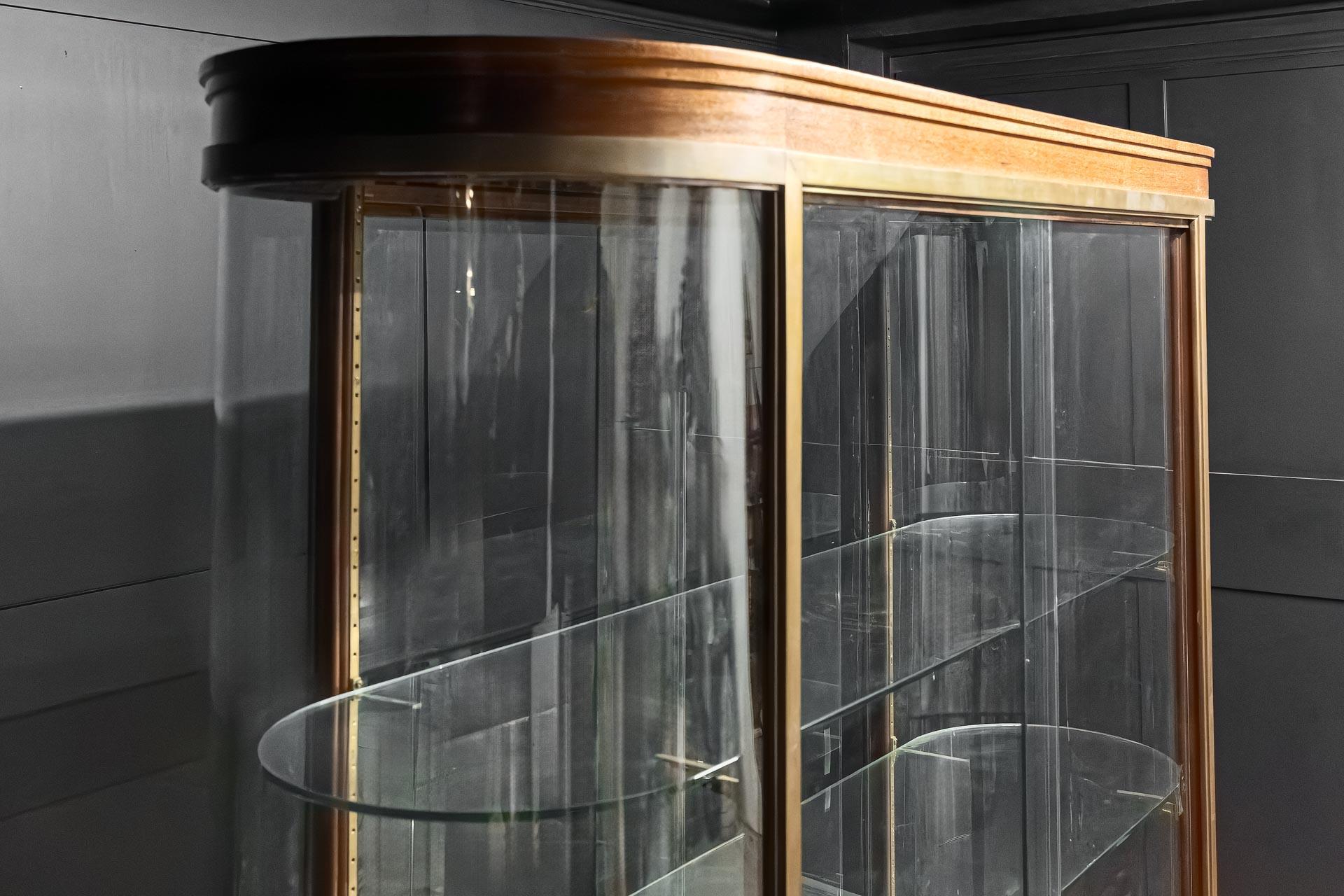 European Vintage pill shaped bow ended display cabinet For Sale