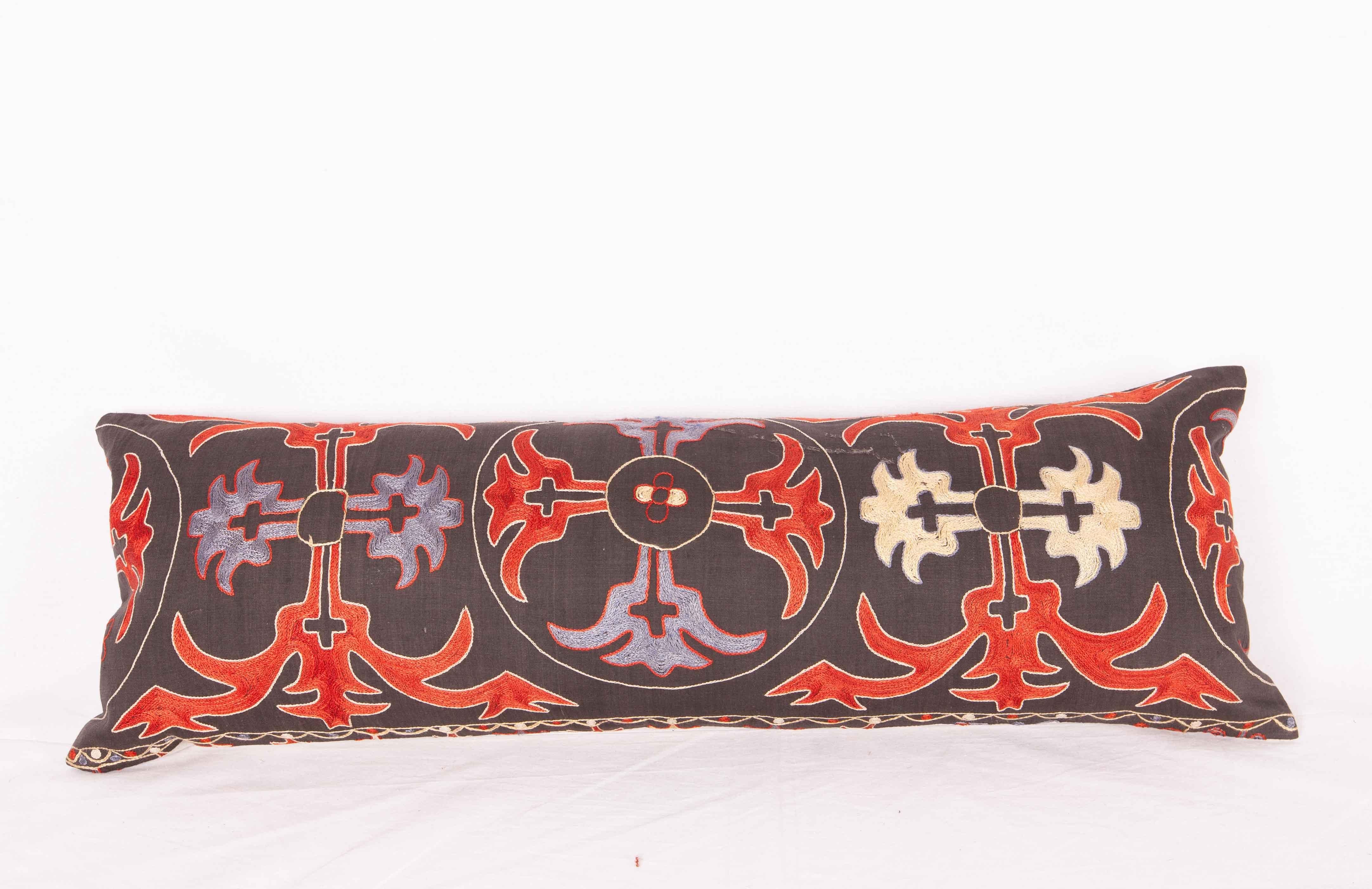 Pillow cases are made from a mid 20th century Kazak or Kyrgyz Tush Kyz embroidery . They do not come with  inserts but  come with a bags made to the size  from  cotton fabric to accommodate the filling materials.  Backing is linen. Please note