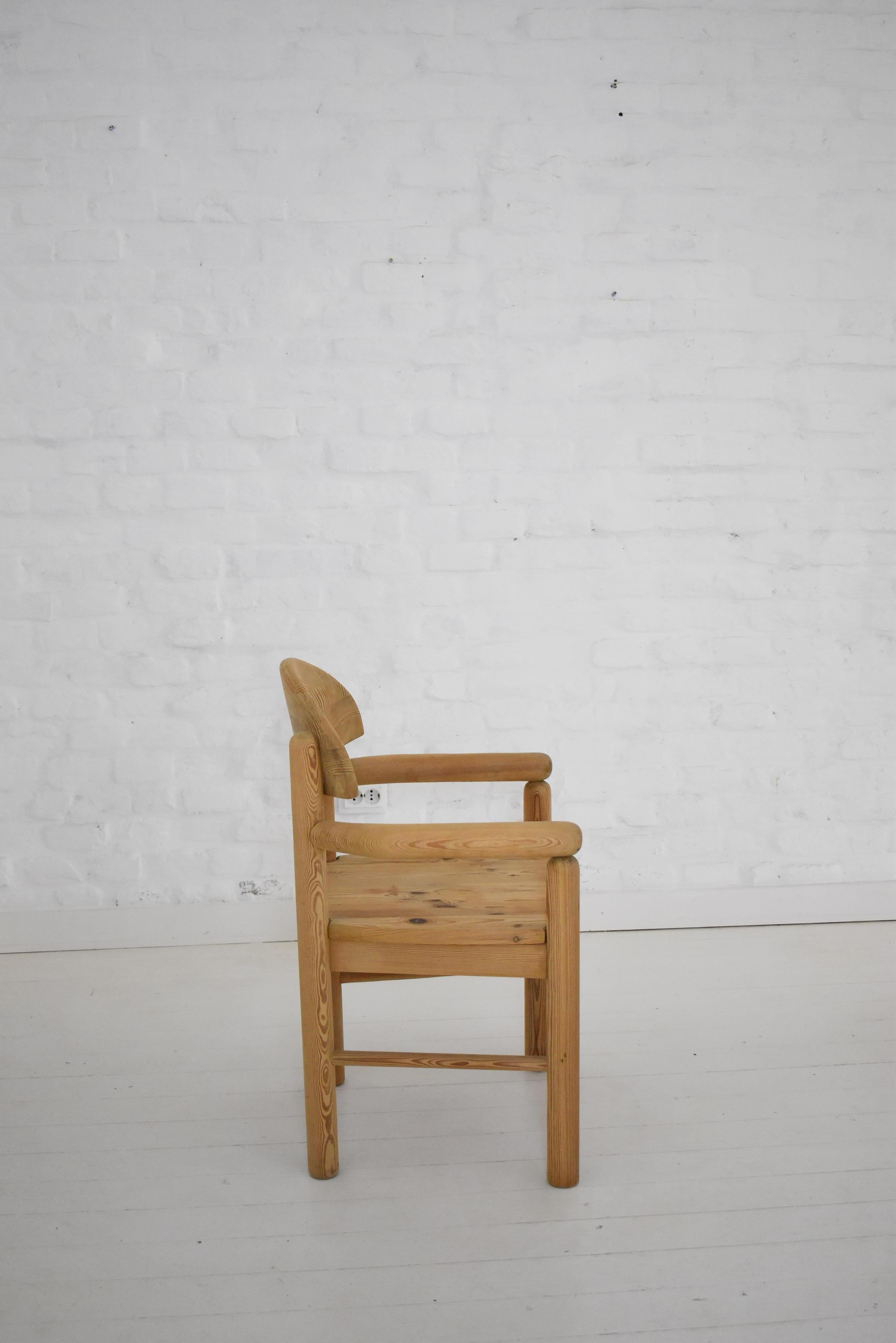 Carver dining chair made from solid pine, designed by Rainer Daumiller, and manufactured by Hirtshals Sawmill in Denmark, circa 1970s.

Very well made solid carver chair in good over all condition, some signs of wear.
  