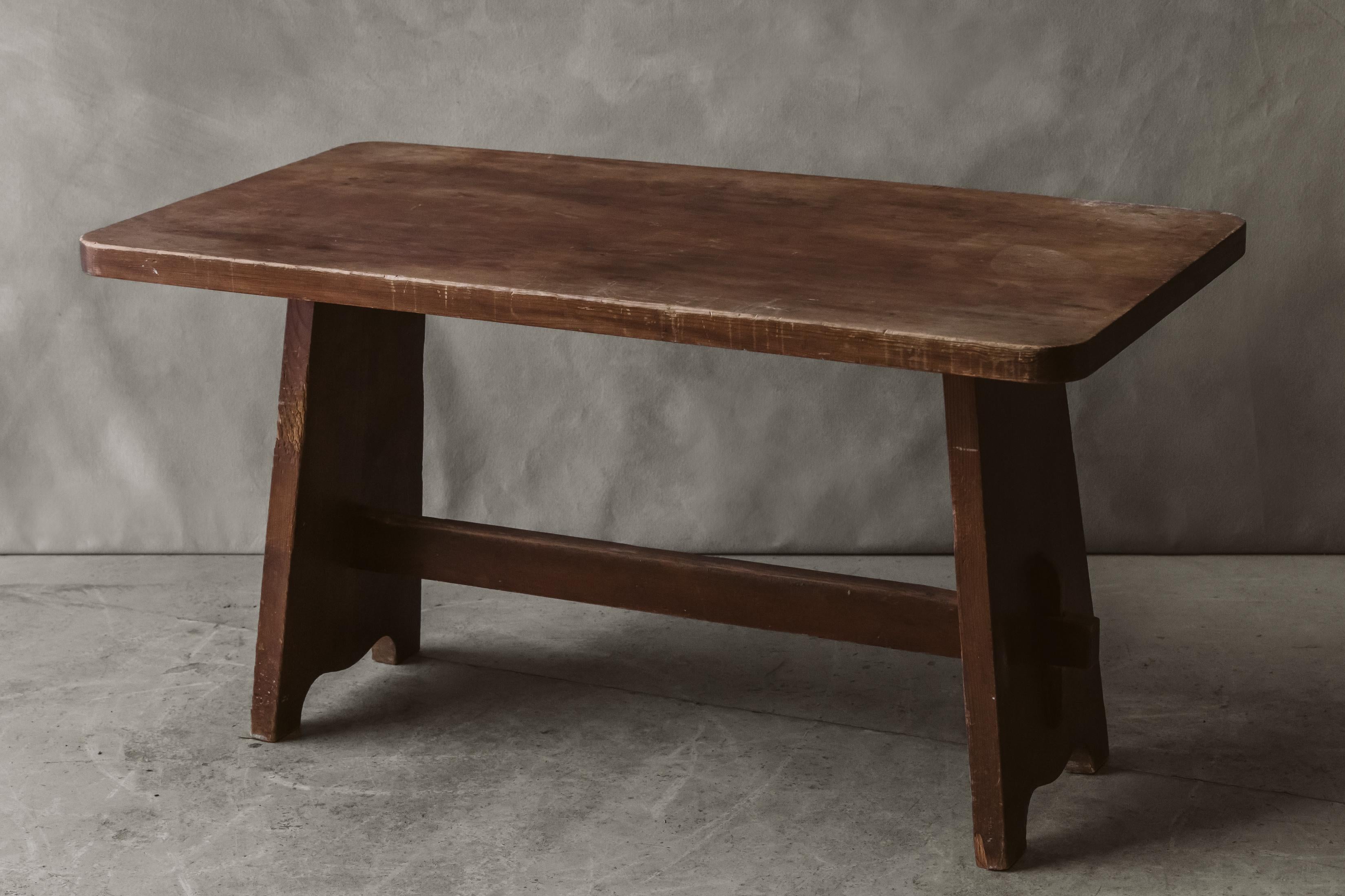 Vintage pine center table from Sweden, Circa 1950. Solid stained pine with light wear and use. 

We don't have the time to write an extensive description on each of our pieces. We prefer to speak directly with our clients.  So, If you have any