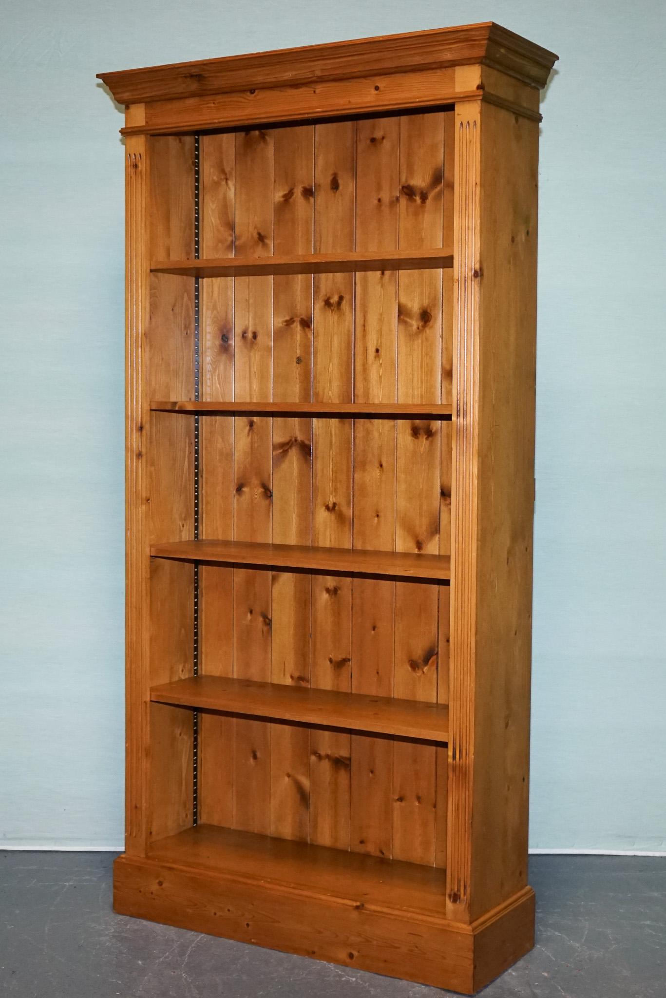 
Antiques of London



This antique English open bookcase, crafted from solid pine, showcases the timeless charm of 19th to early 20th-century country furniture. It features a moulded cornice and a plinth base, hallmarks of traditional English