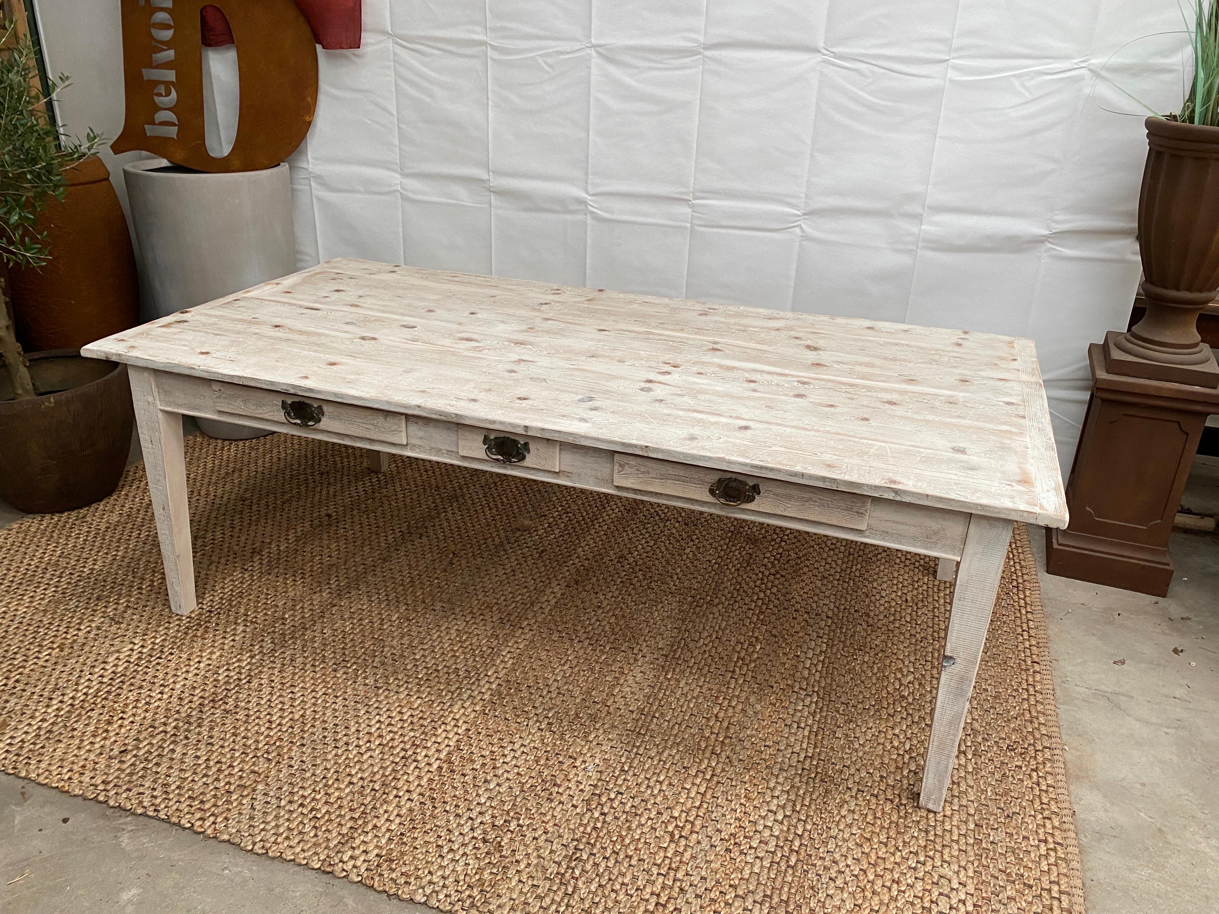 Vintage pine rectangular wash Scandinavian dining table L221.

A handsome and impressive scandi white wash pine farmhouse rectangular dining table. Beautiful textured thick plank top, cleated ends, over six frieze drawers and nouveau handles.