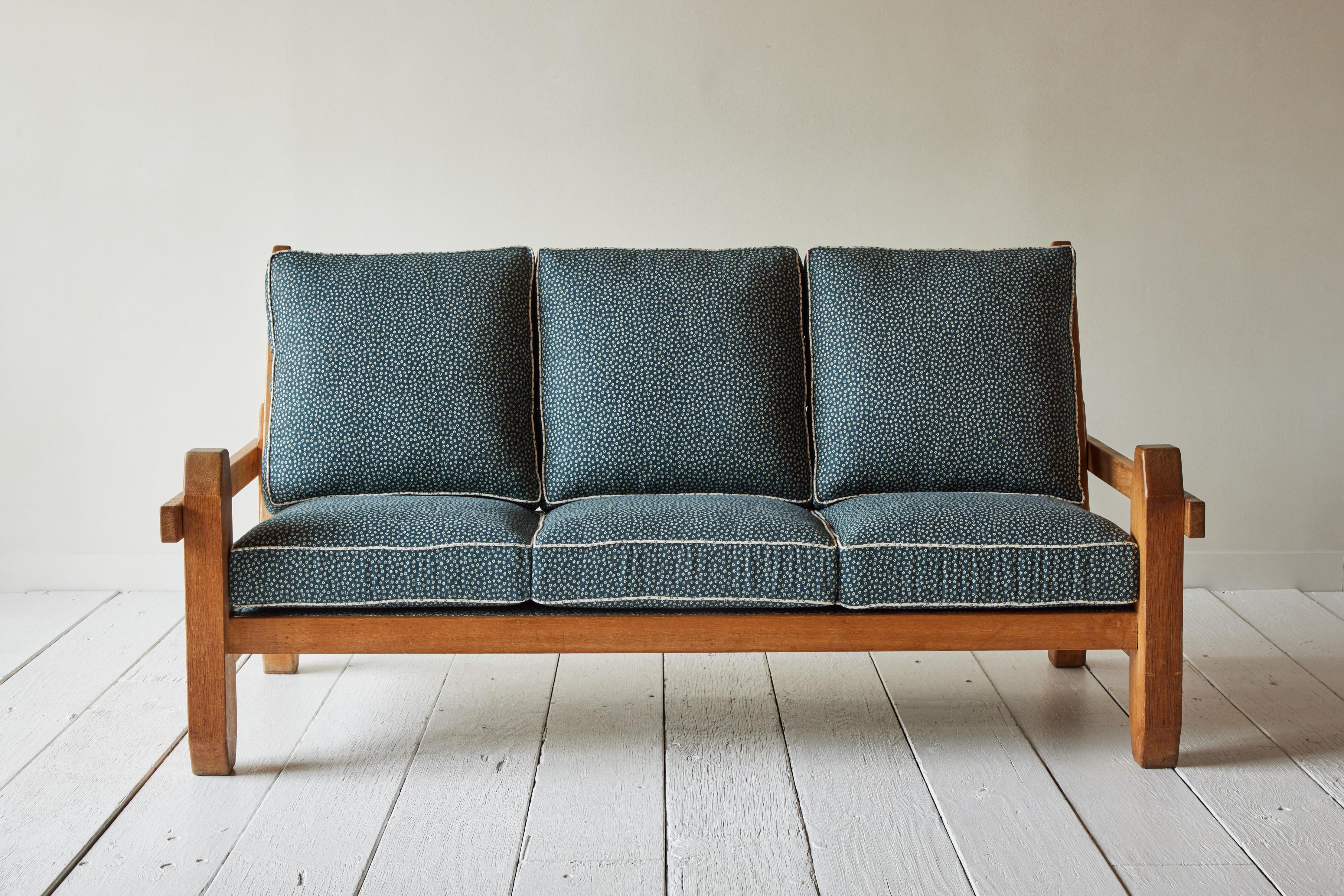 Vintage pine sofa in the style of Ape van Apeldoorn upholstered in a Robert Kime indigo fabric.