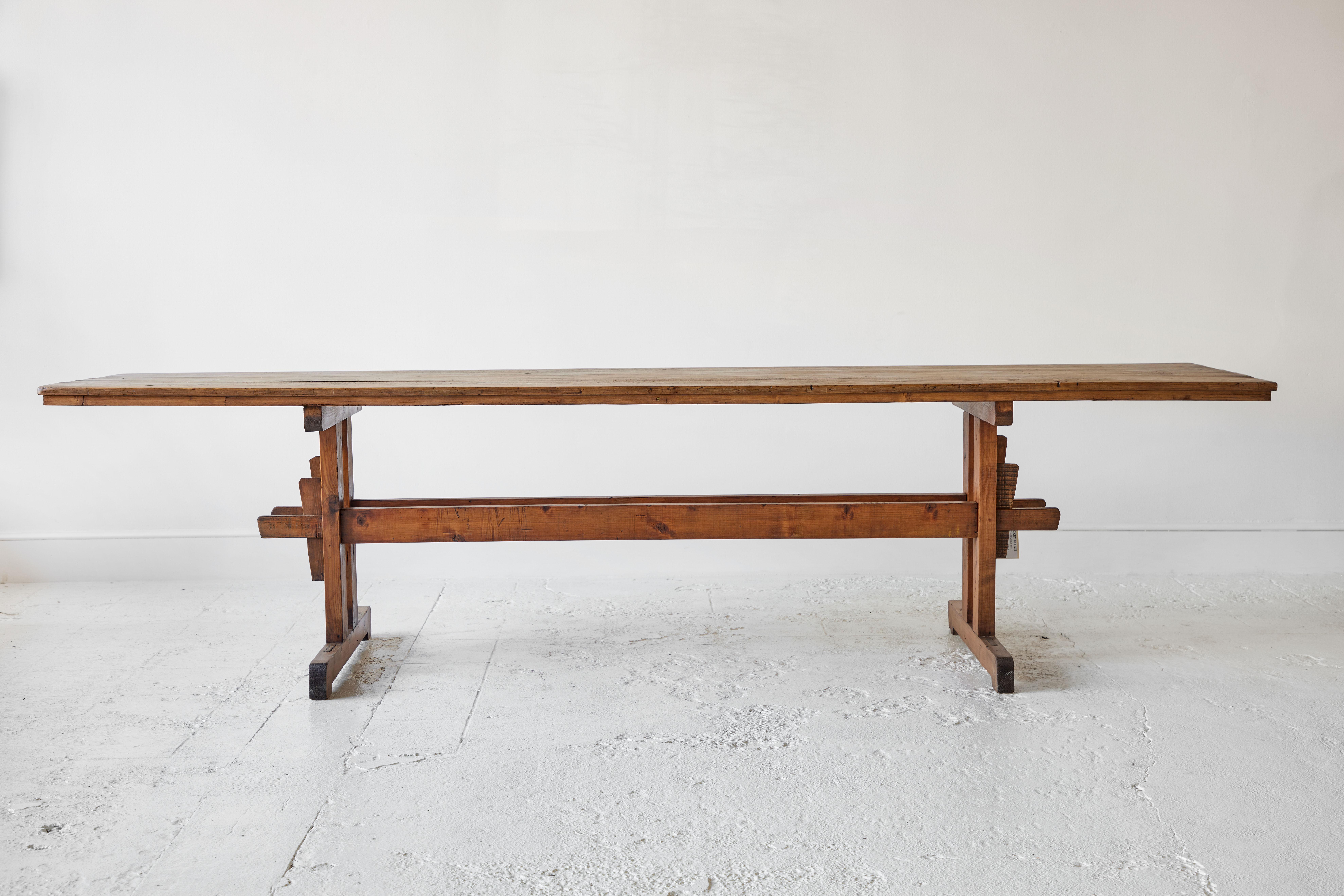 Vintage long stained pine trestle farm table in beautiful vintage condition.