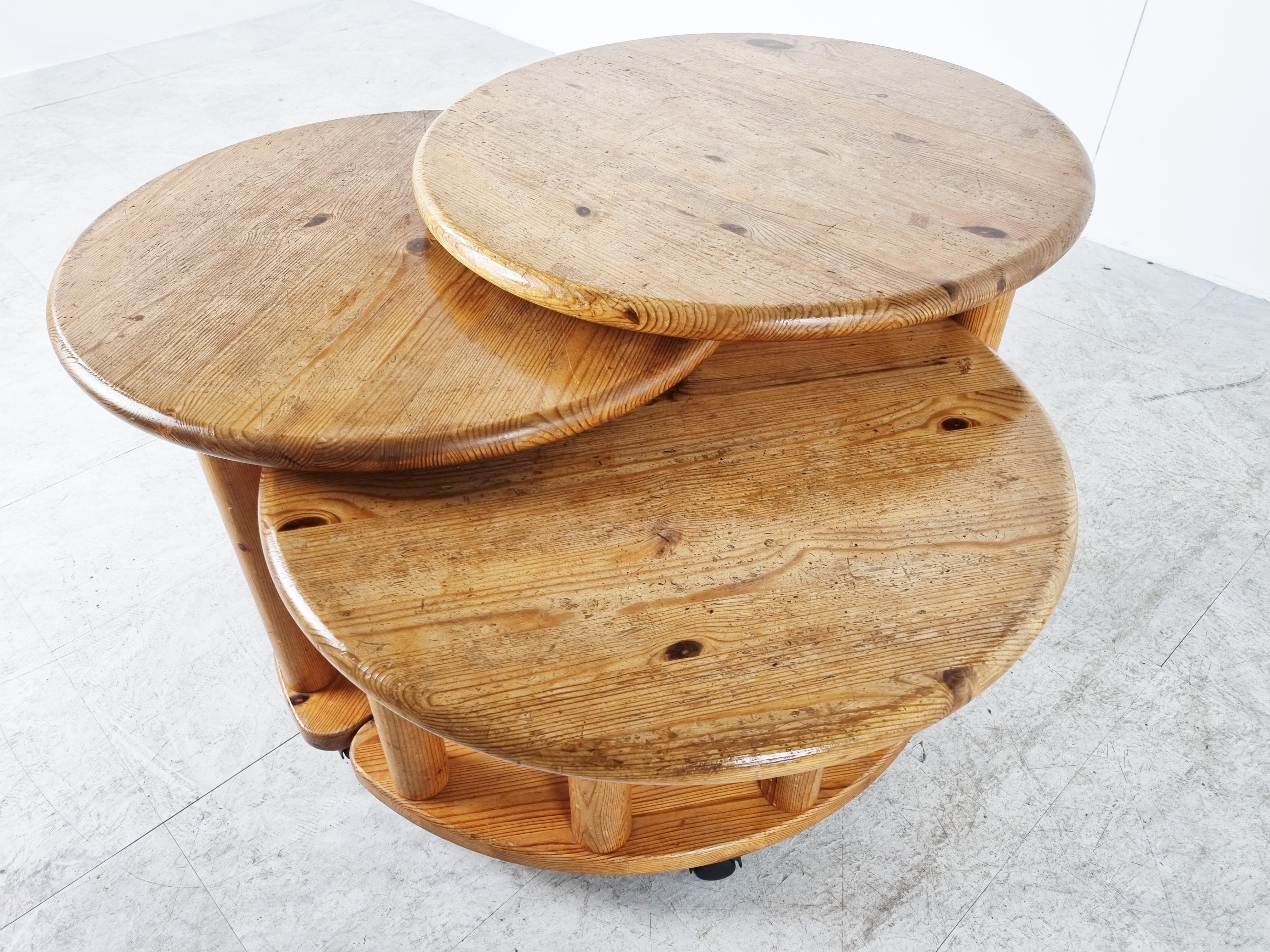 Vintage round pine wood coffee tables in the style of Rainer Daumiller.

The tables can be positioned randomly or they perfectly fit into each other. They also have some wheels to easily move them around.

Condition: Original condition, normal