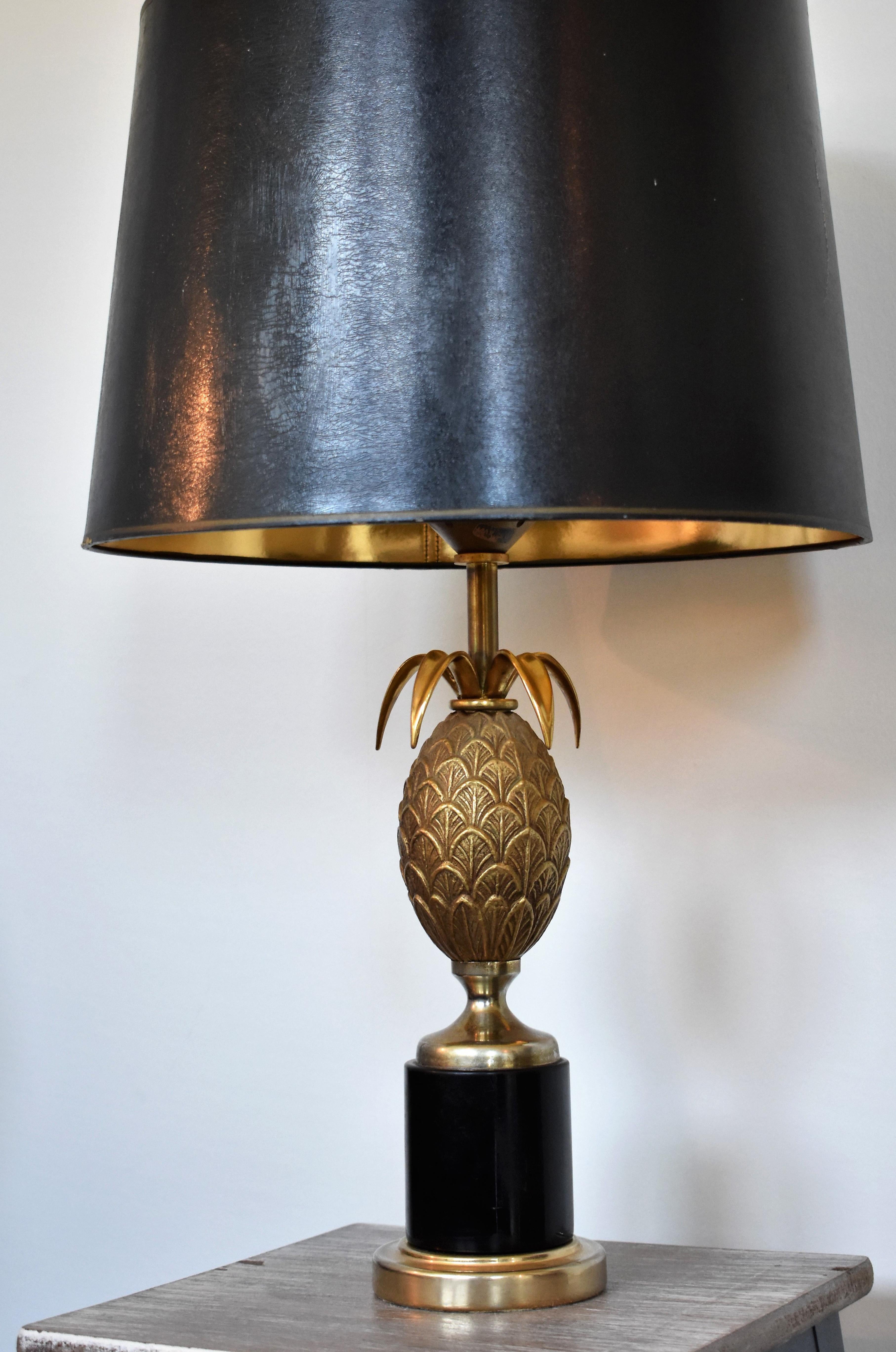 Information:
This original brass pineapple lamp is in the style of Maison Charles and was designed in circa 1970. Of the different Maison Charles lamps, the pineapple lamps are most famous and most admired. 

The shade is a showmodel and will not be