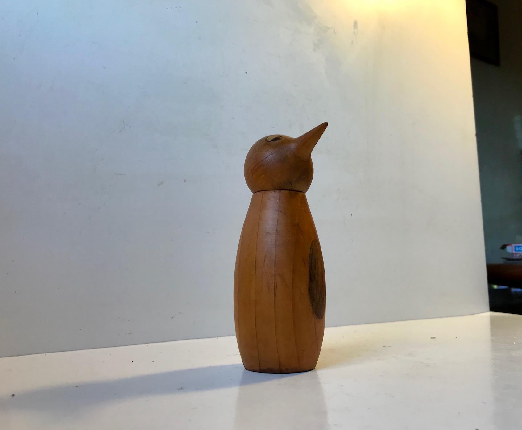 Curious jar in the shape of a penguin. Made from hand carved pine set with details in walnut and cherry. Made in the workshop of ELJ in Denmark during the 1940s in a style reminiscent of Kay Bojesen and Hans Bolling.
 