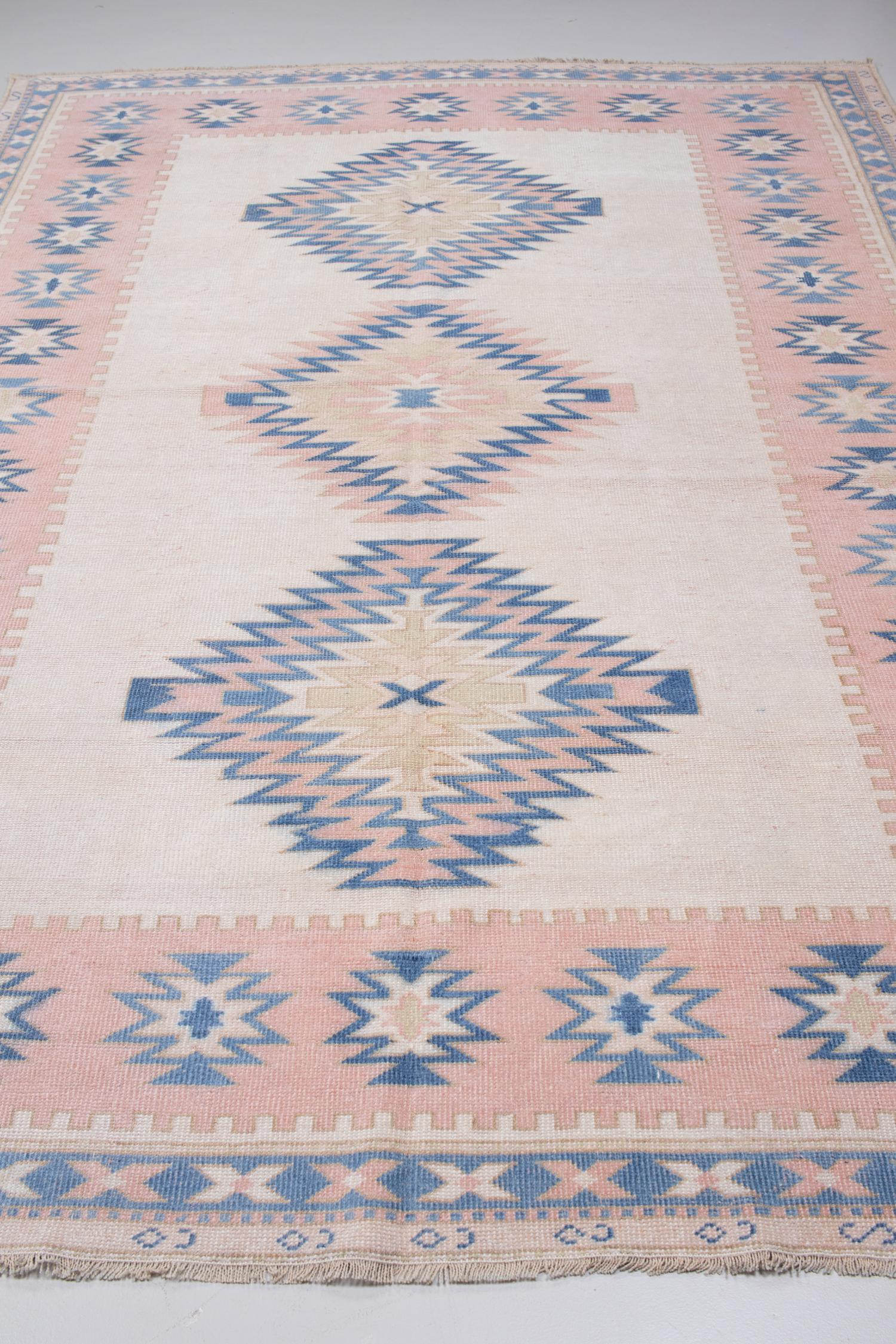 Mid-20th Century Vintage Pink and Blue Anatolian Rug For Sale