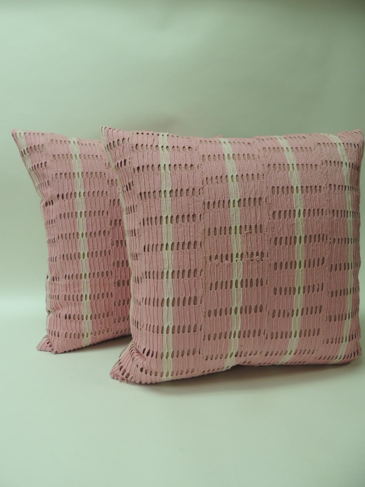 Vintage pink and natural African woven decorative throw pillows.
Yoruba textiles with dusty pink underlining and backing in cotton.
Closed by stitch (no zipper.) Handcrafted and designed in the USA with custom made pillow inserts.
Note: Four