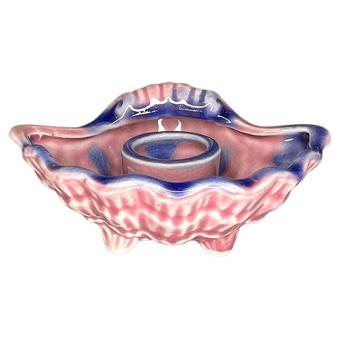 A vintage majolica ceramic clam shell or seashell candle holder and bowl set. This set was made in Japan and includes two candle holders for tapered candles, and one bowl or dish. Each piece is ceramic and formed into clam shells. The bowl features