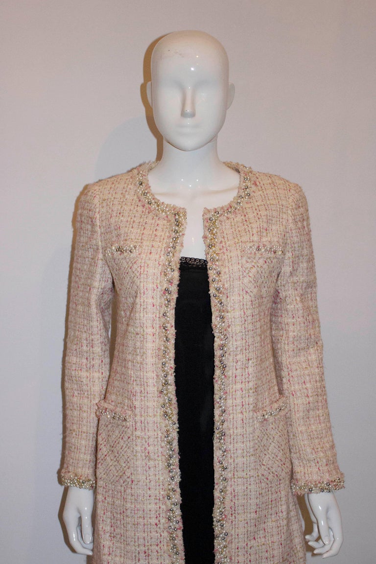 Sold at Auction: CHANEL Vintage 1960s Boucle & Fur Coat