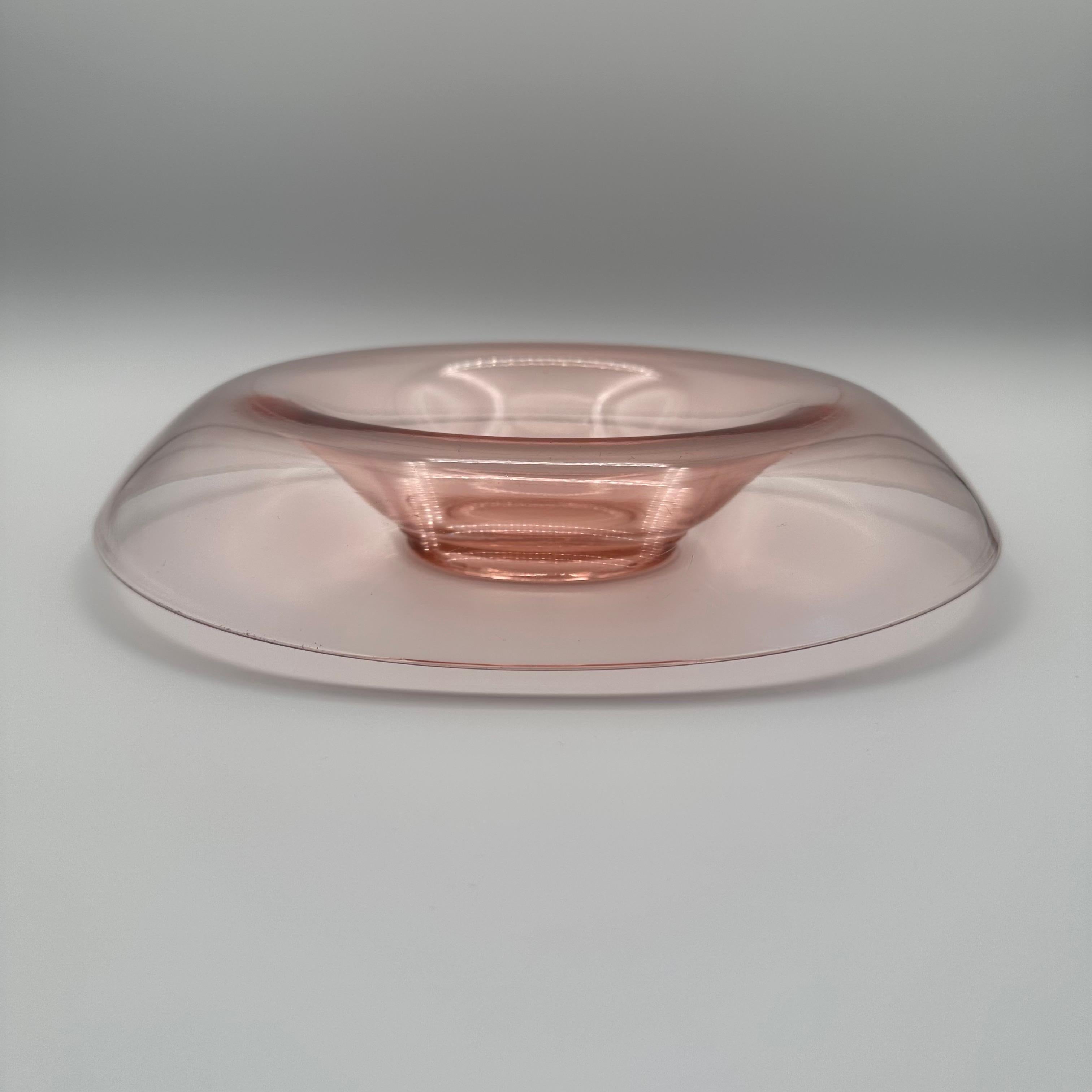 A vintage round centerpiece, bowl or shallow vase in pink molded glass. Amazing and unique curved waterfall console bowl shape, with the edges of the bowl folding nearly all the way over. 

Some fine scratches and a few indentations to the edge